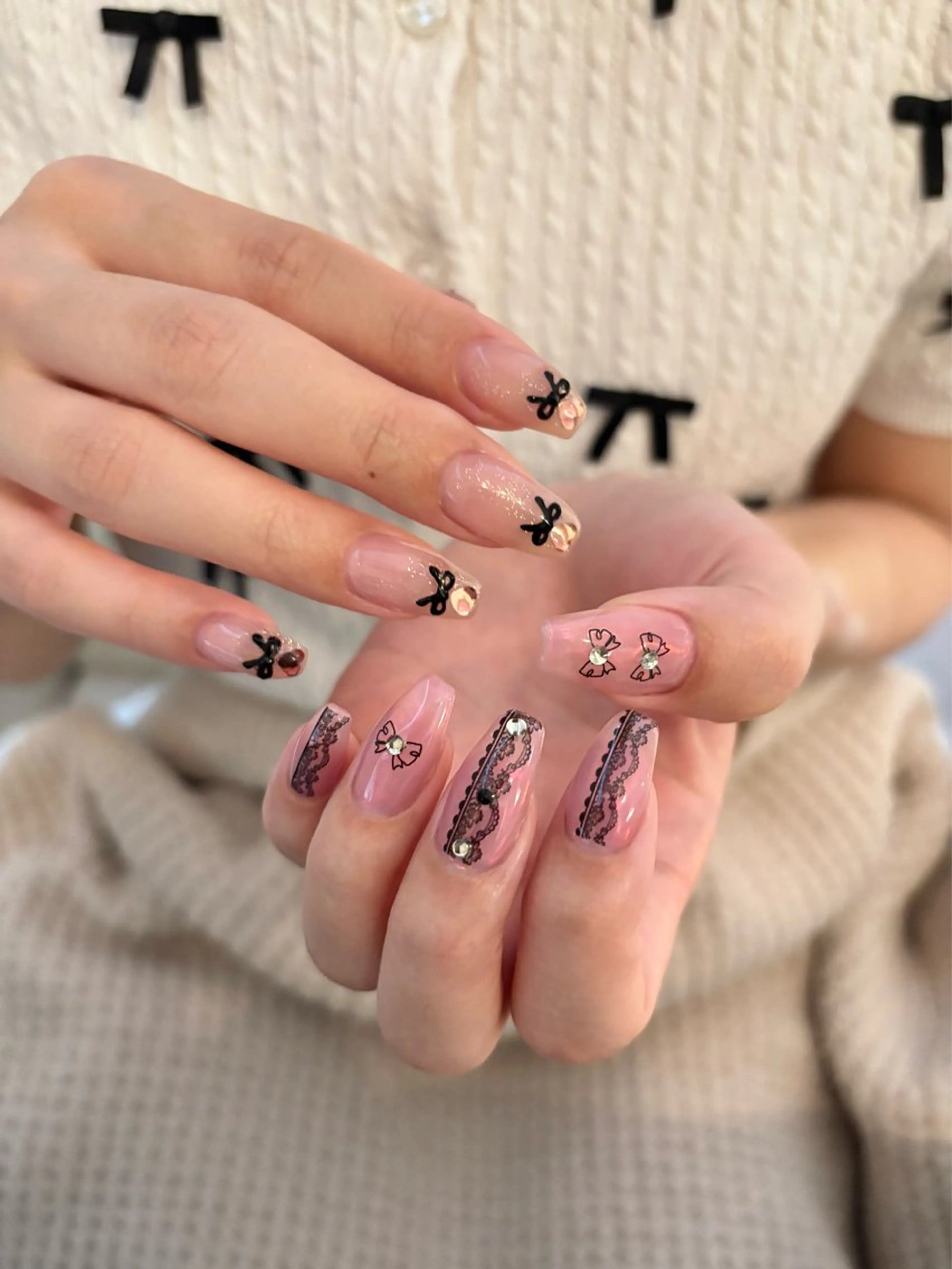 ネイル ロングネイル リボン ハンドネイル soirée所属・nail salon Soiréeのネイルデザイン