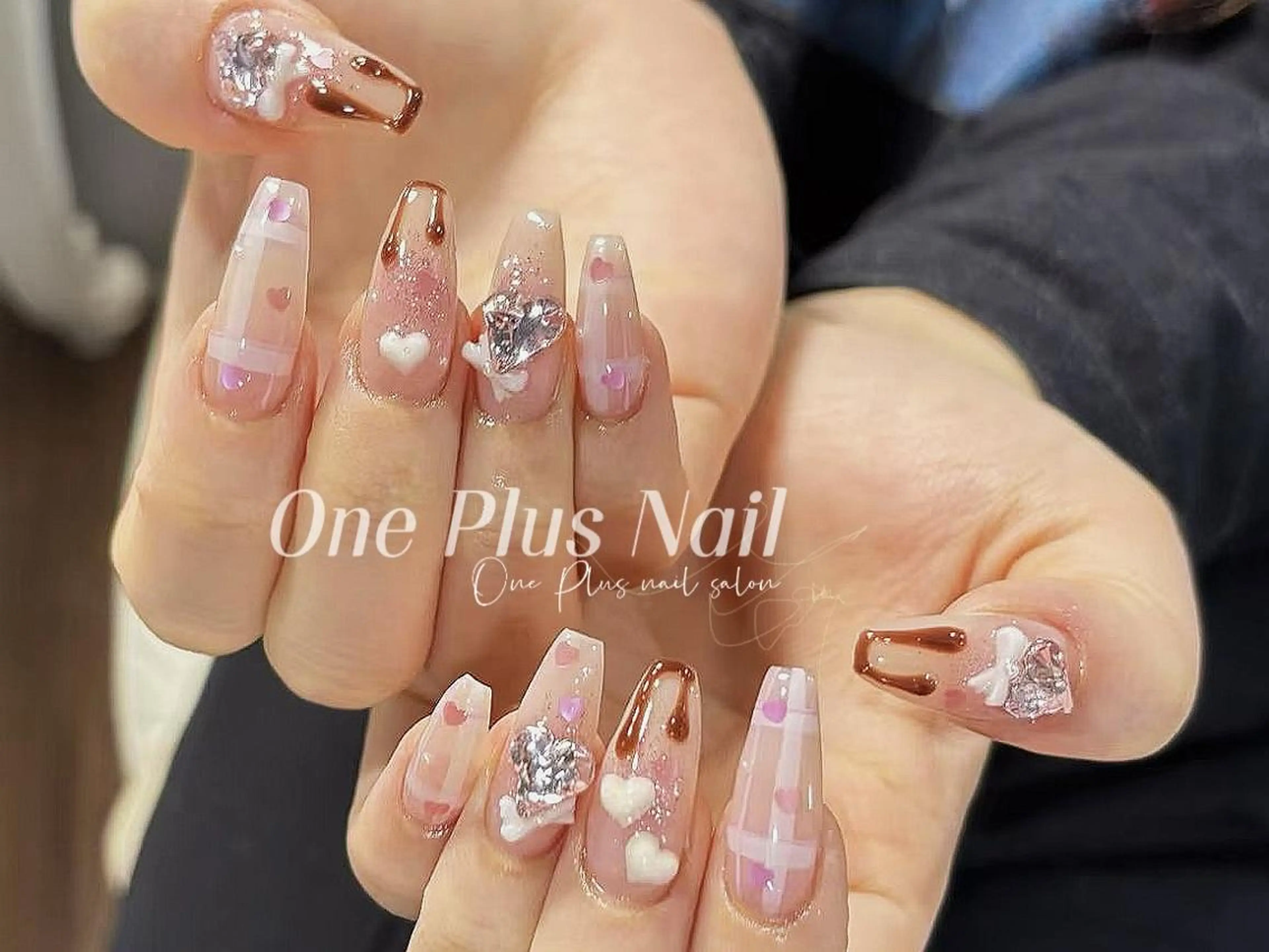 ネイル アートネイル ブラウン ハート ピンク バレンタイン ハンドネイル One Plus Nail Salonのネイルデザイン