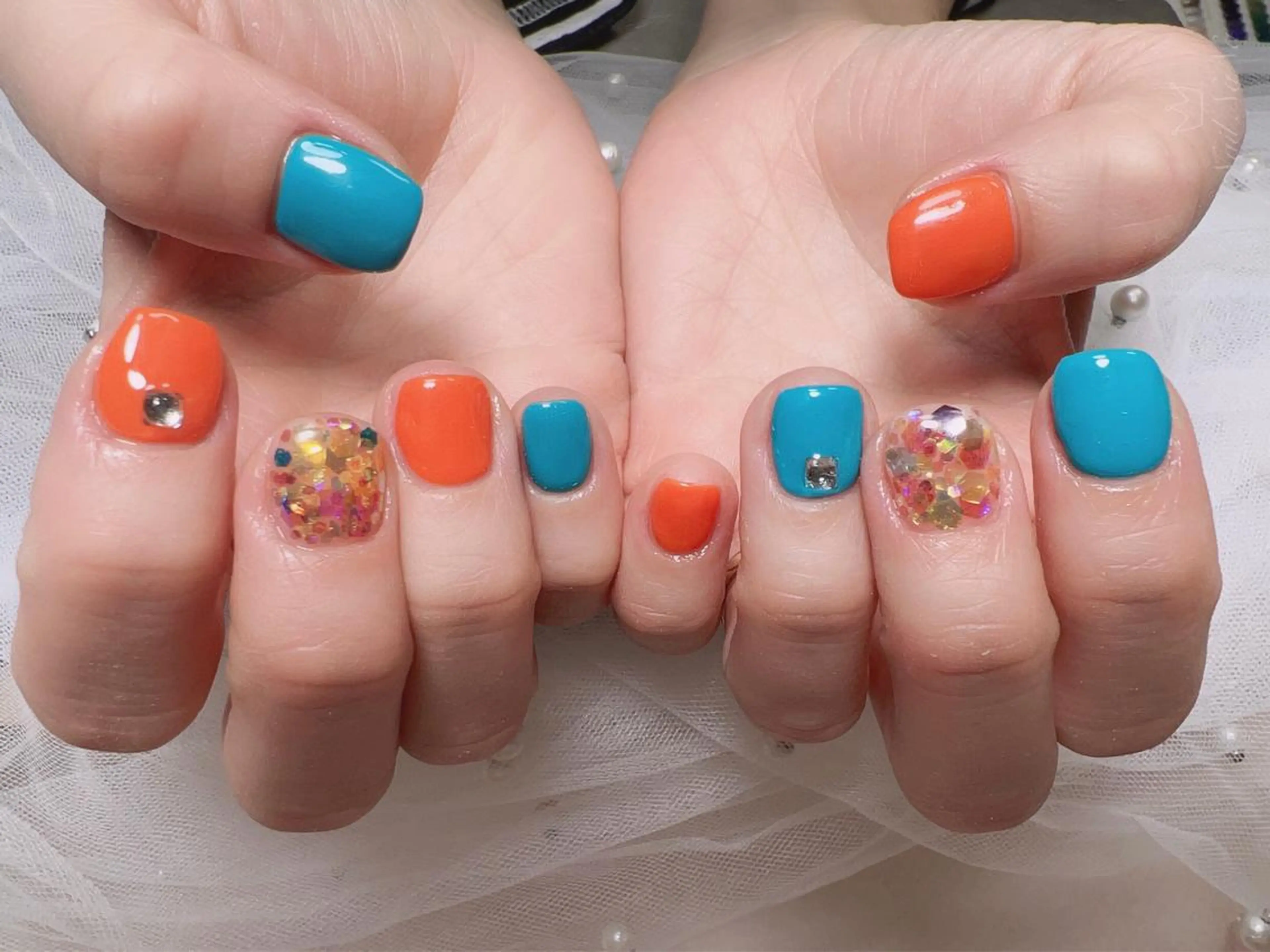 ショート カラー ネイル オレンジ ブルー オレンジ ハンドネイル Nail NaNaのネイルデザイン