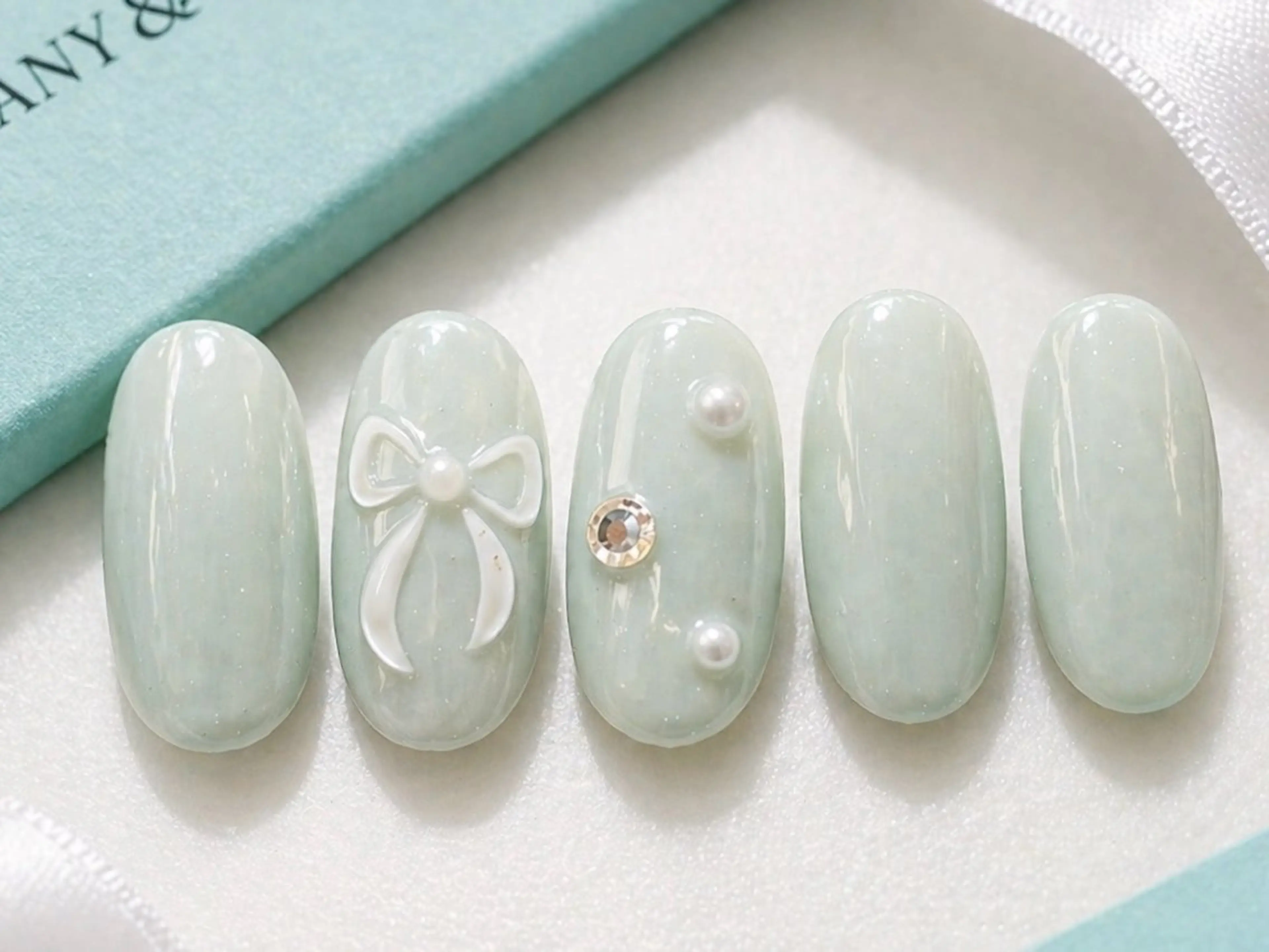 🎀(オフ込み)ティファニーリボンnail/6週間長持ちの写真