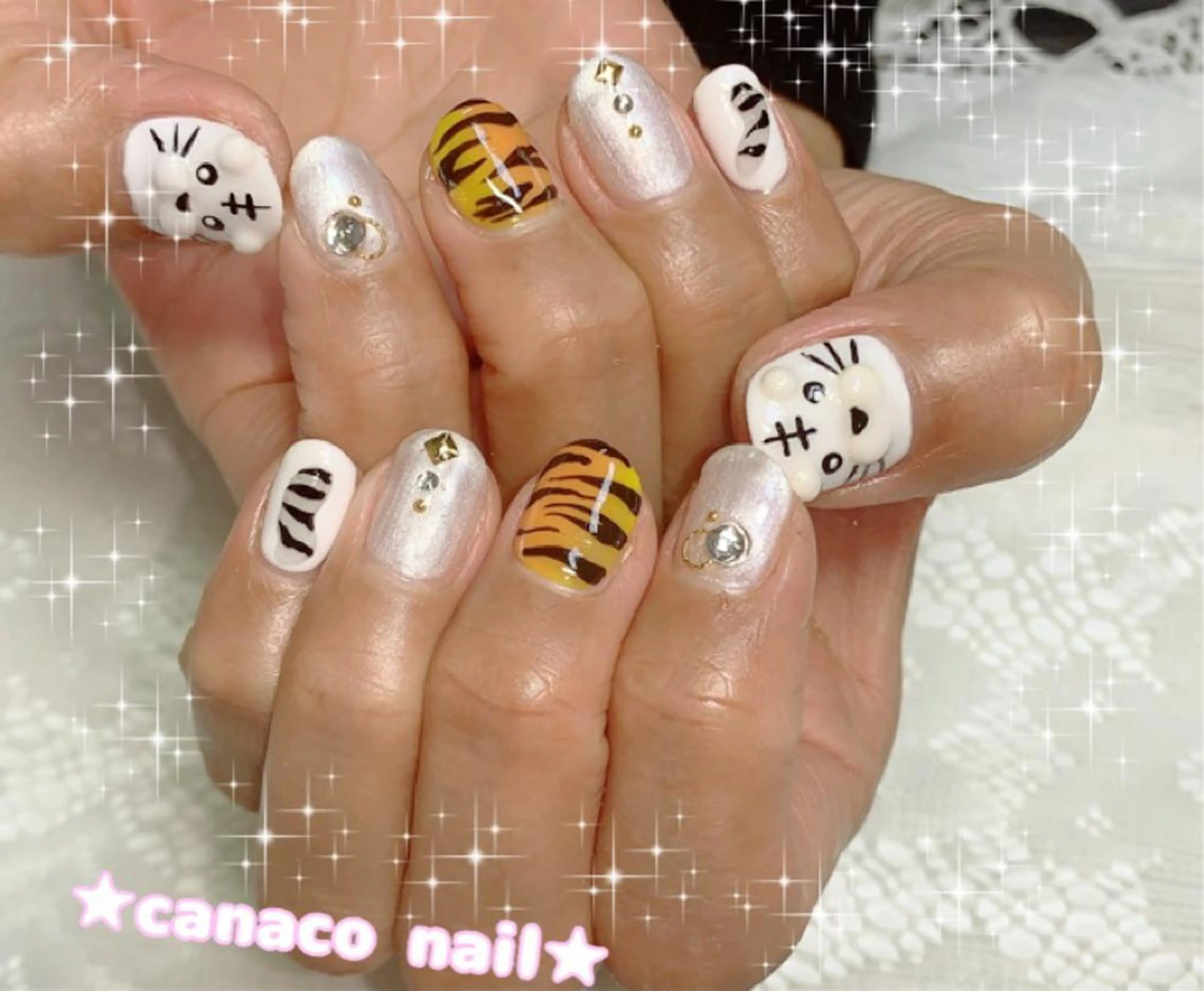 ネイル アートネイル ジェルネイル パラジェル ストーンネイル ホワイト Felice所属・ベテランネイル cnc  nailのネイルデザイン