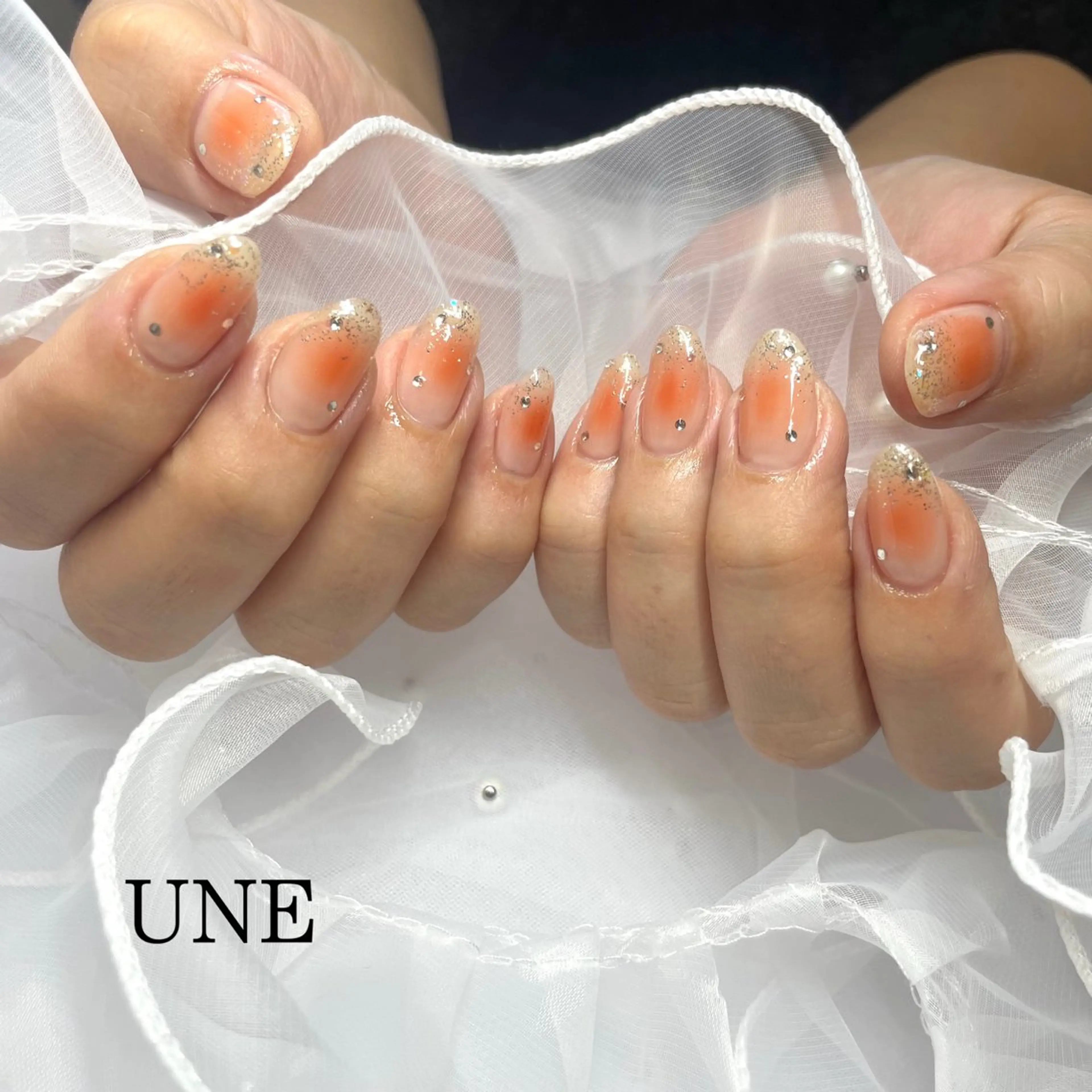 ネイル チークネイル UNE.【ユヌ】 Jr.NANAのネイルデザイン