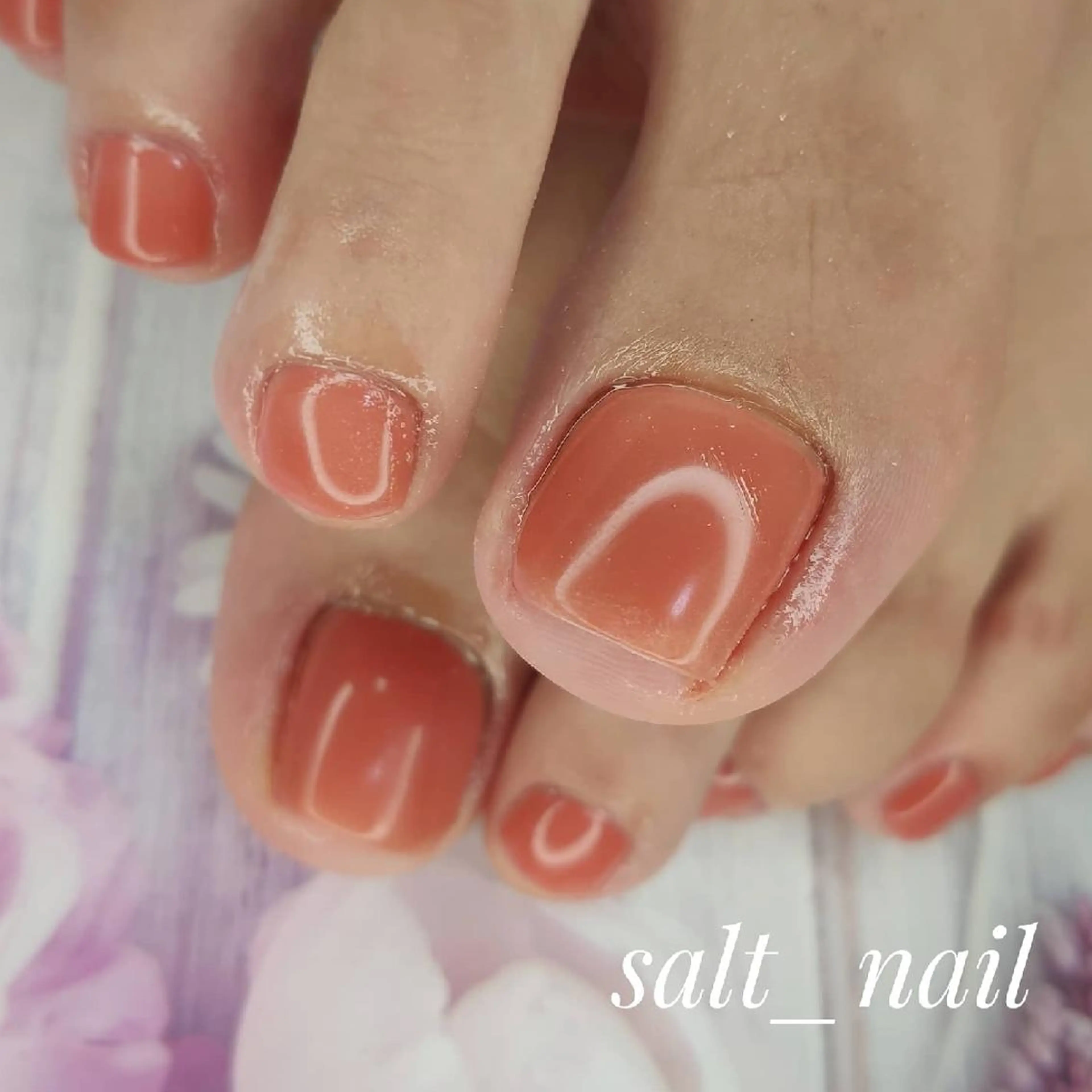 ネイル ワンカラーネイル オレンジ フットネイル 個人サロン saltnailのネイルデザイン