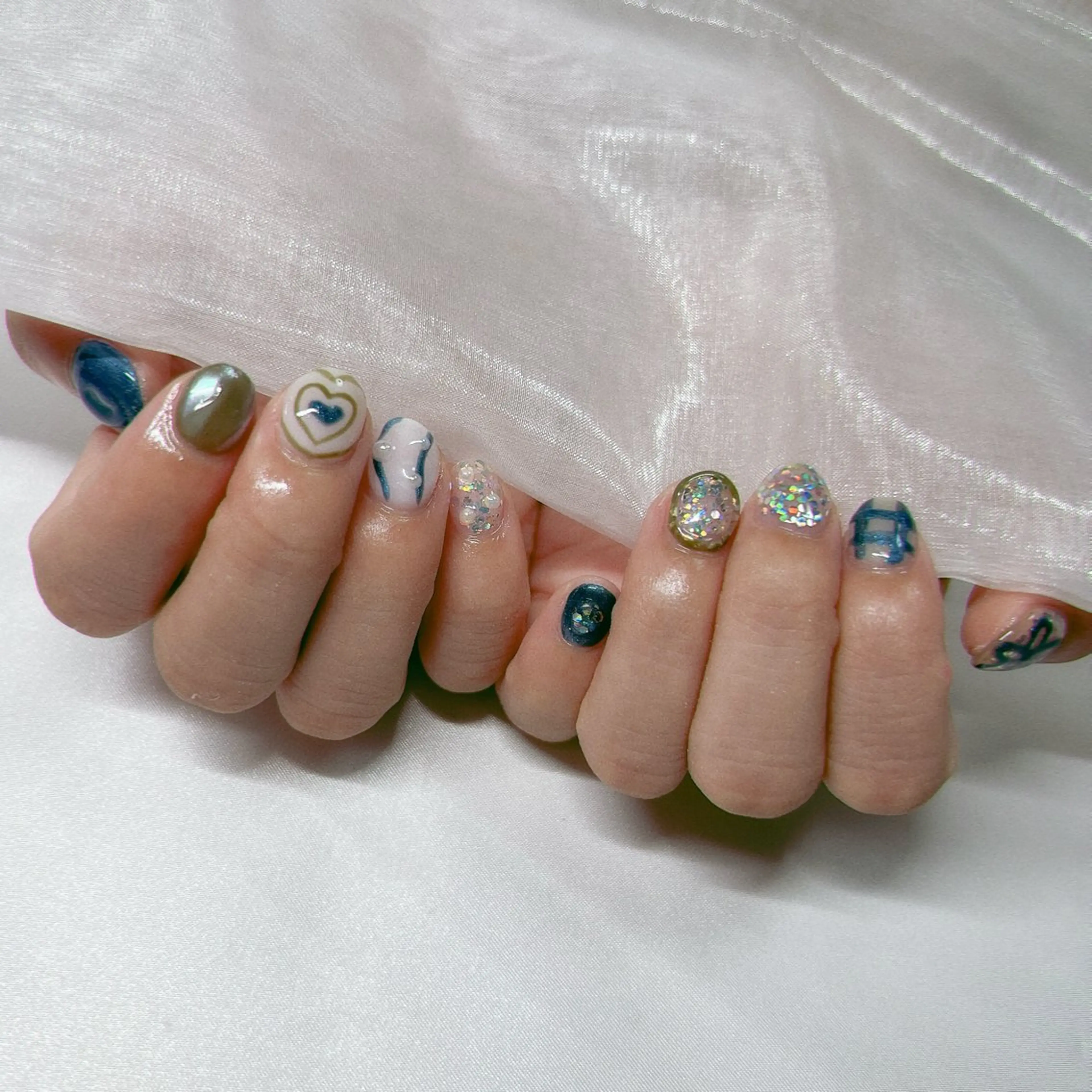 ネイル ジェルネイル 韓国ネイル ラメ(グリッター) マグネットネイル ミラーネイル ハンドネイル nail salon Rewardのネイルデザイン