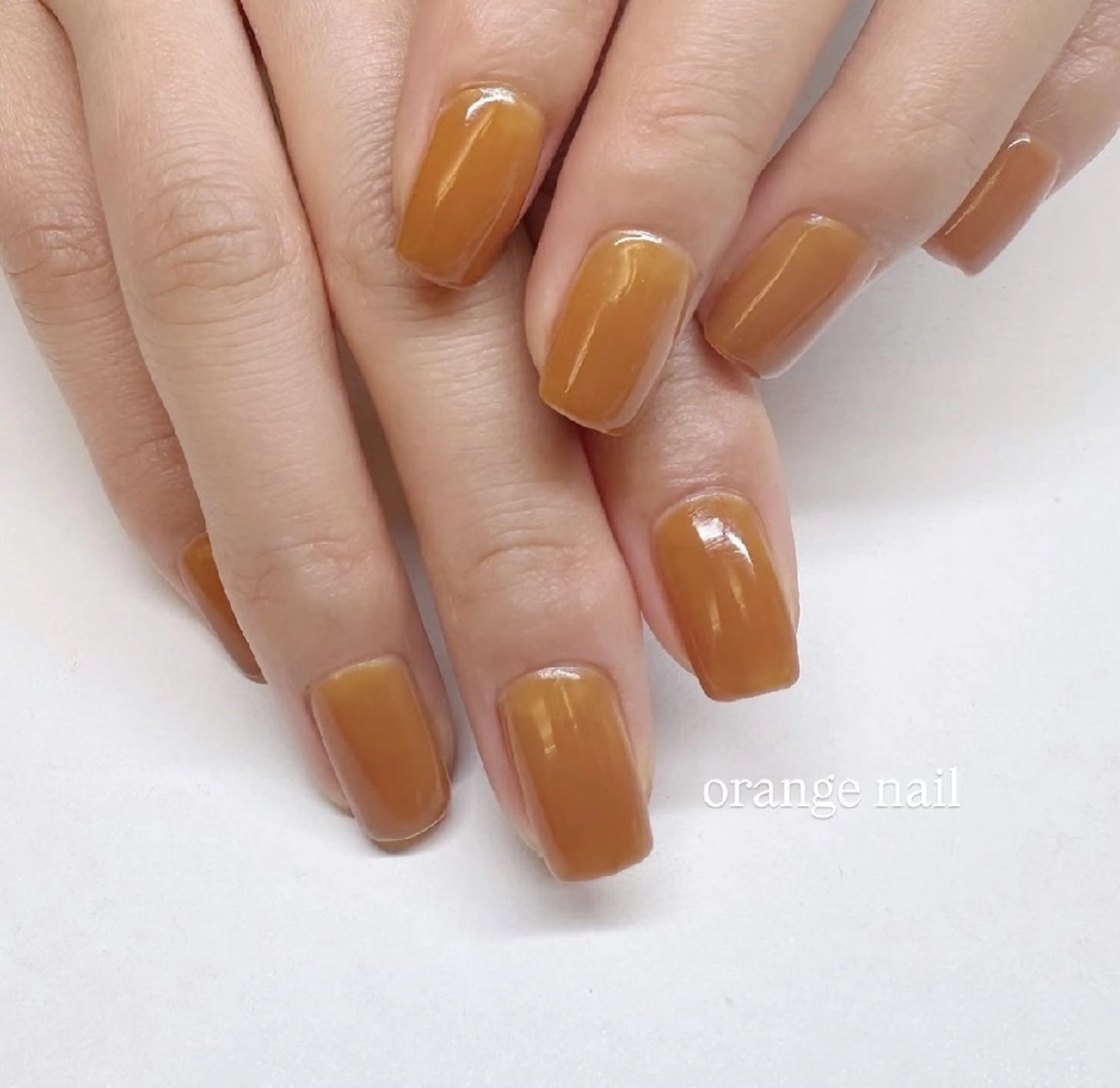 ネイル オフィスネイル ワンカラーネイル オレンジ 春ネイル ハンドネイル Moana Ayumiのネイルデザイン