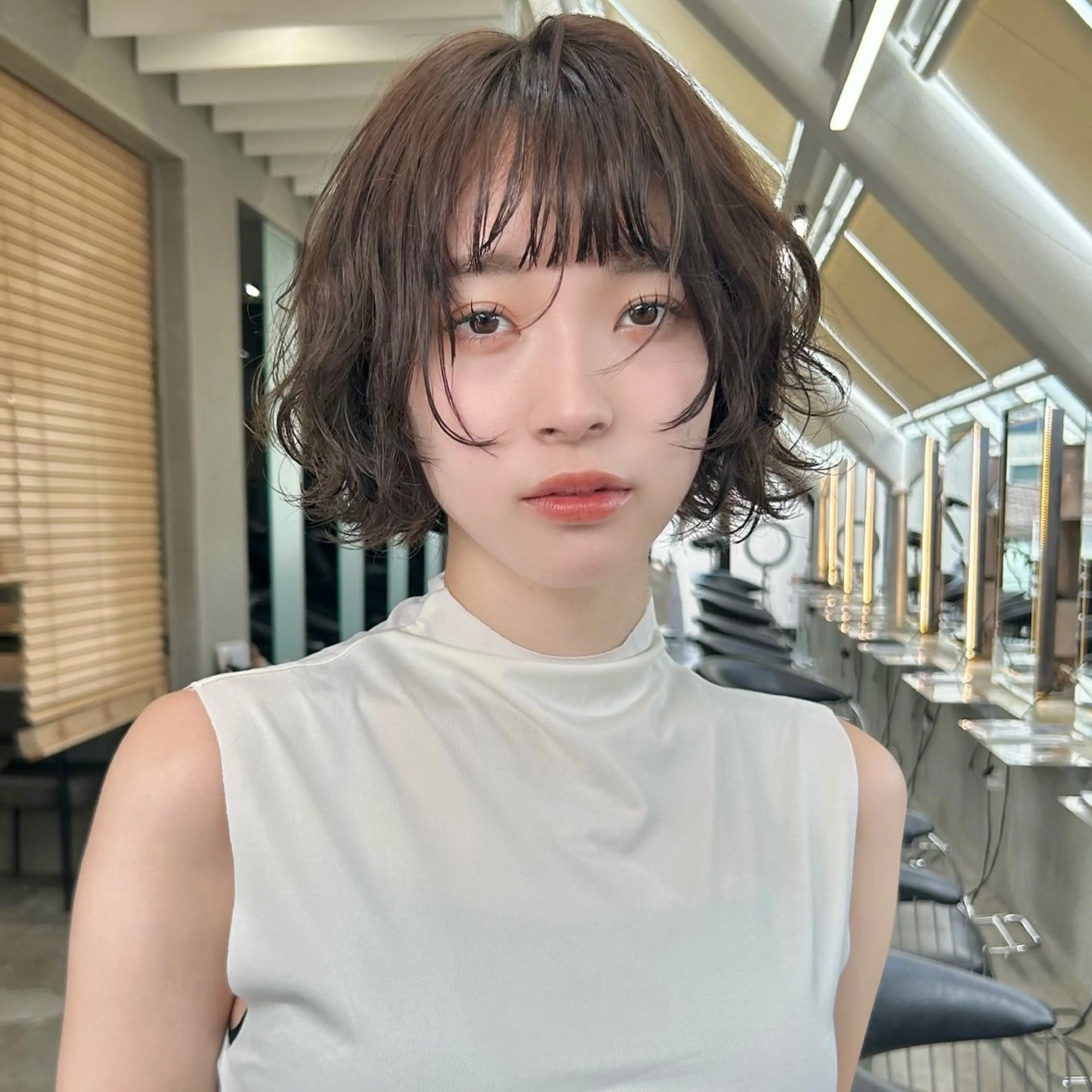 ショート パーマ ボブ ショートヘア ニュアンスパーマ カット ヘアカラー パーマ ボブ/縮毛矯正/ レイヤー/塚田のヘアスタイル