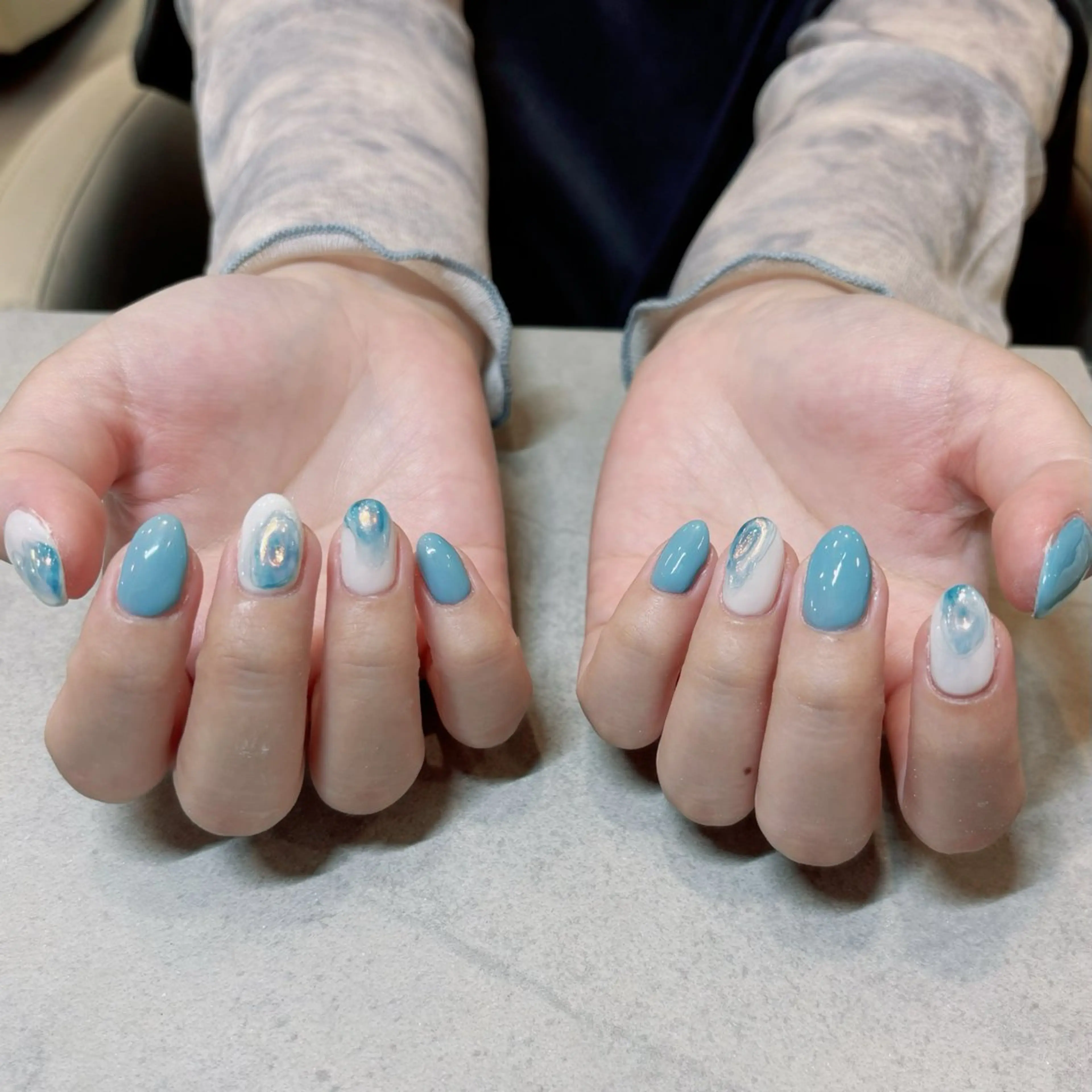 ネイル アートネイル オーロラネイル クリアネイル 水色 オレンジ akane .hのネイルデザイン