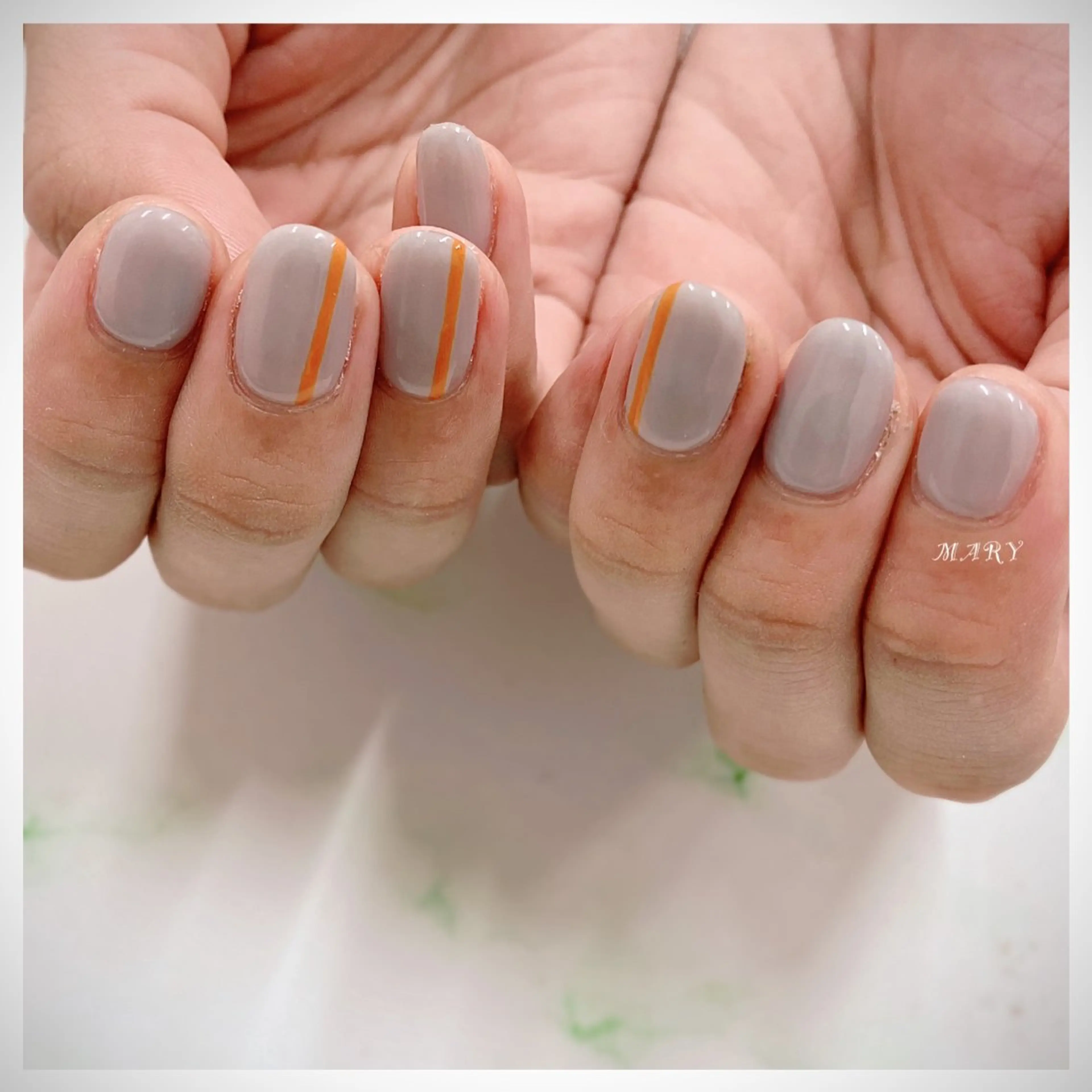 ネイル ニュアンスネイル ワンカラーネイル オレンジ ハンドネイル Mary nail所属・Mary nail .narumiのネイルデザイン