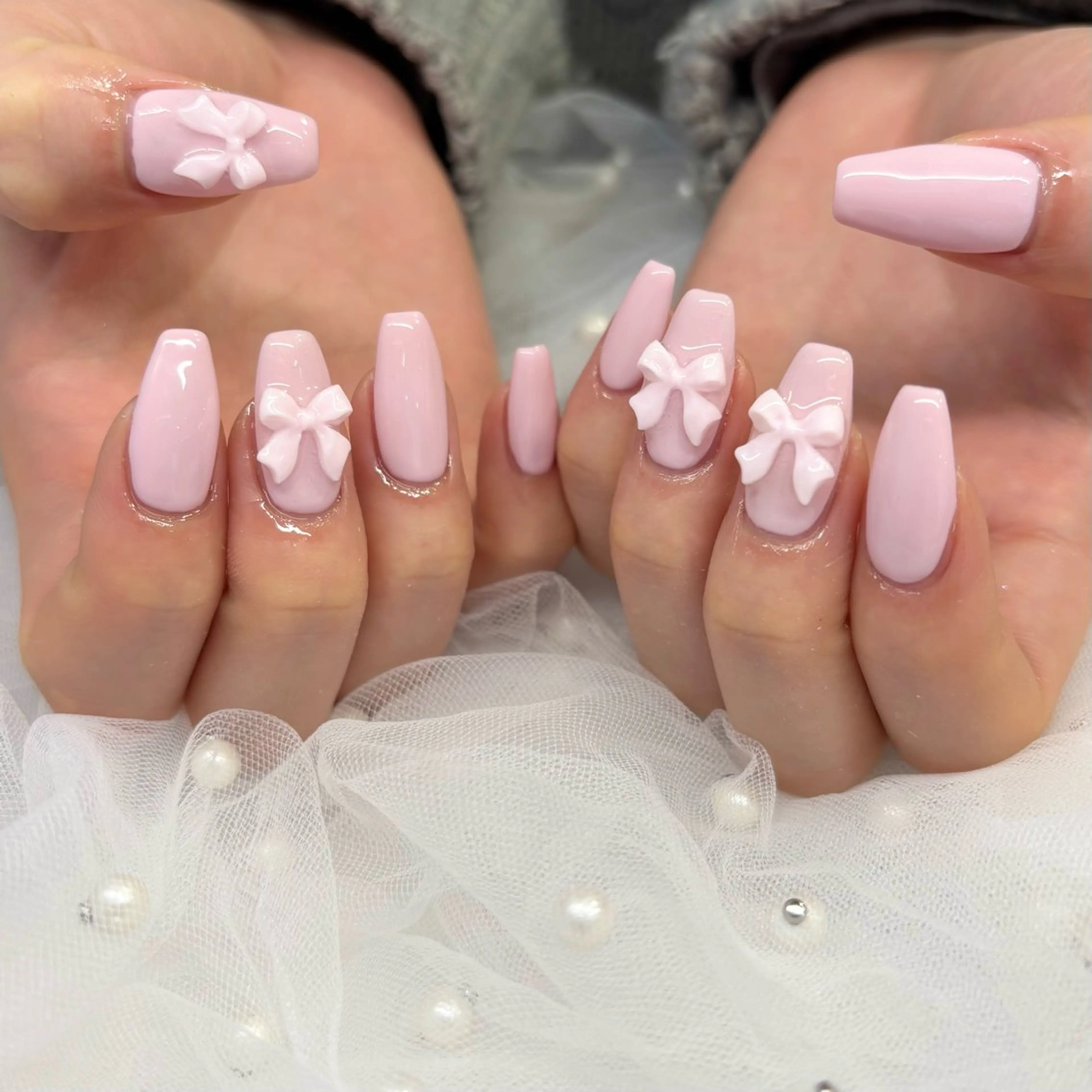 ネイル ワンカラーネイル ピンク リボン ハンドネイル 荒巻 めいのネイルデザイン