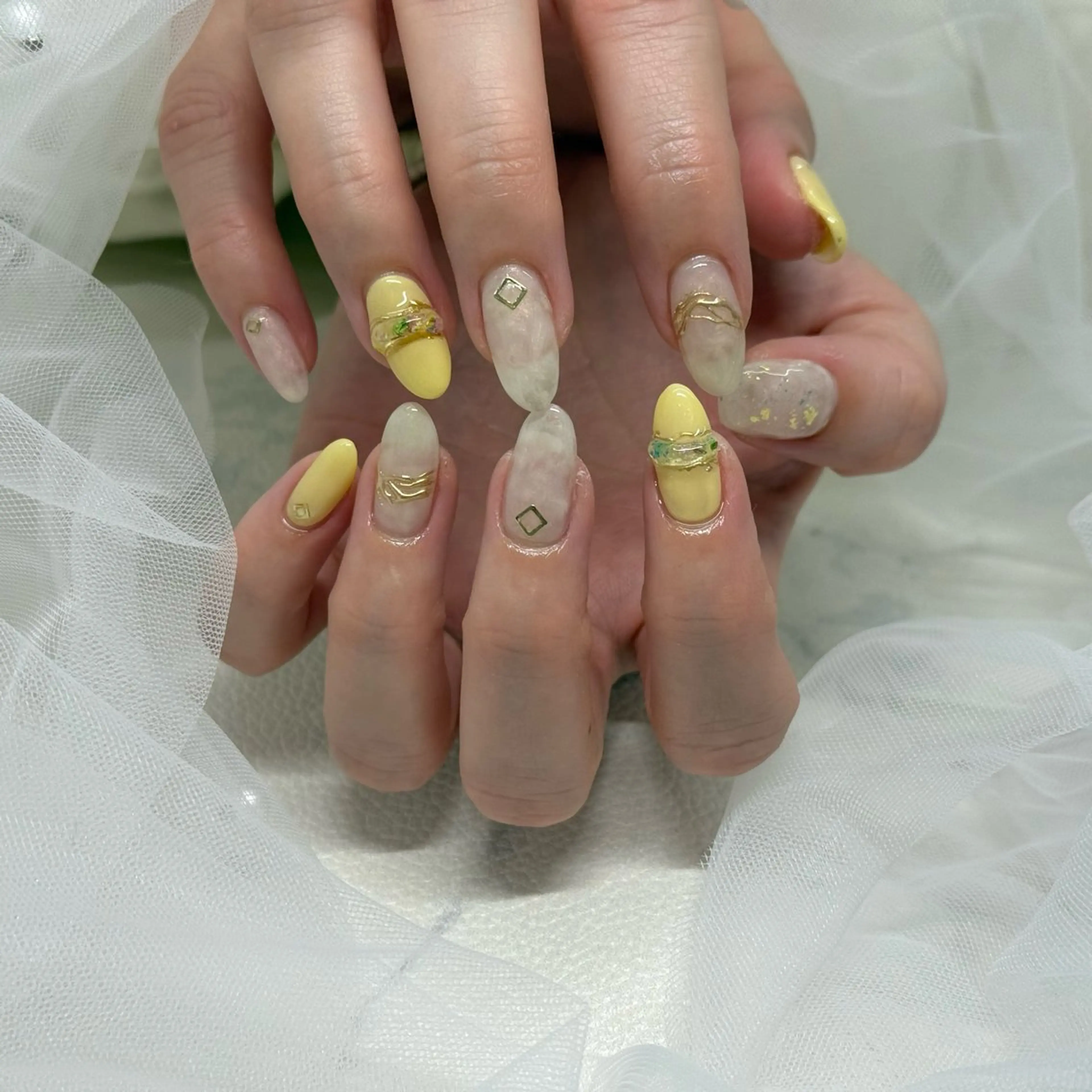 ネイル パステルネイル 黄色 salone Regina 【サローネ レジーナ】所属・Regina Marinaのネイルデザイン