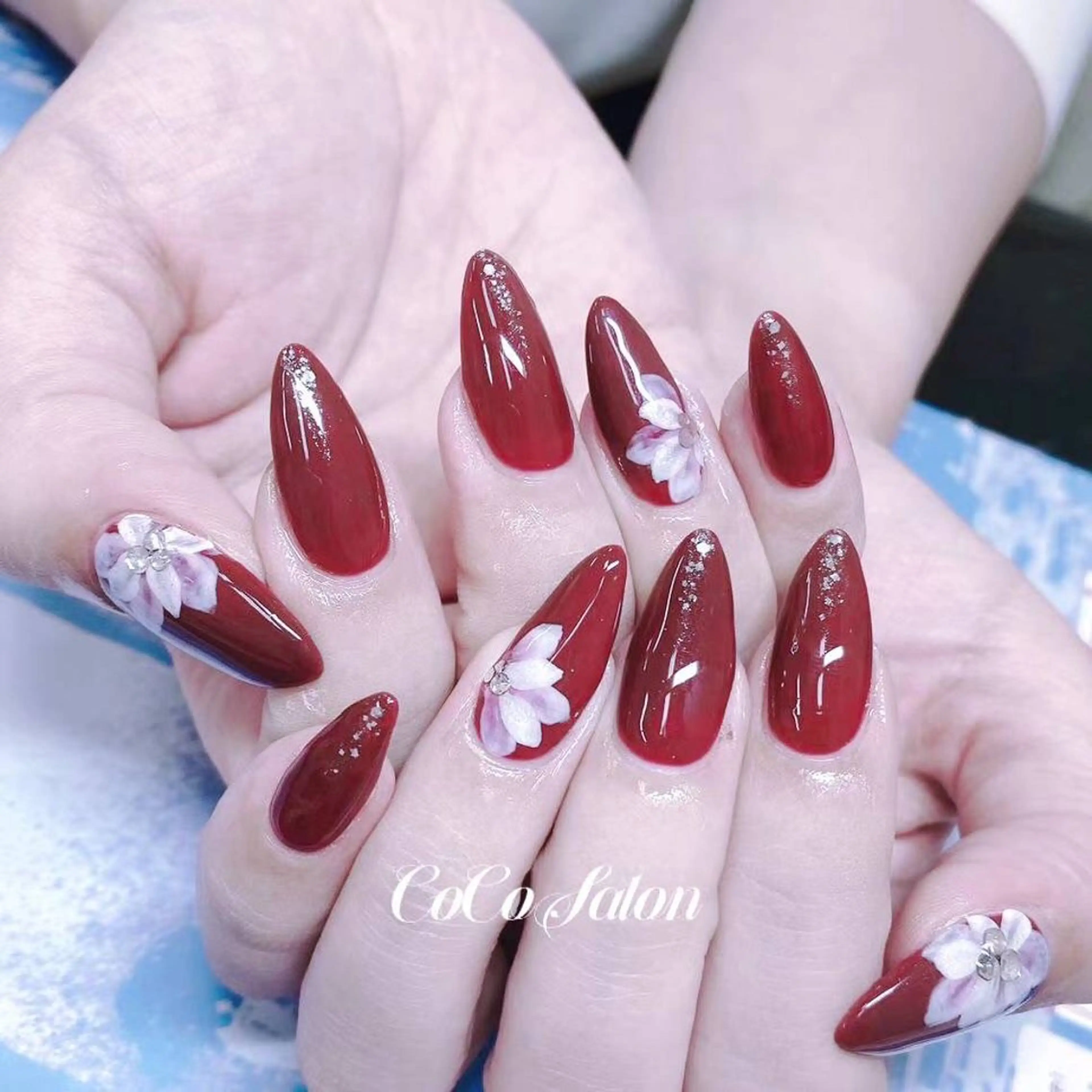 ネイル ボルドー 成人式 フラワーネイル ワンカラーネイル 春ネイル CoCo Salon ネイル/睫毛/脱毛のネイルデザイン