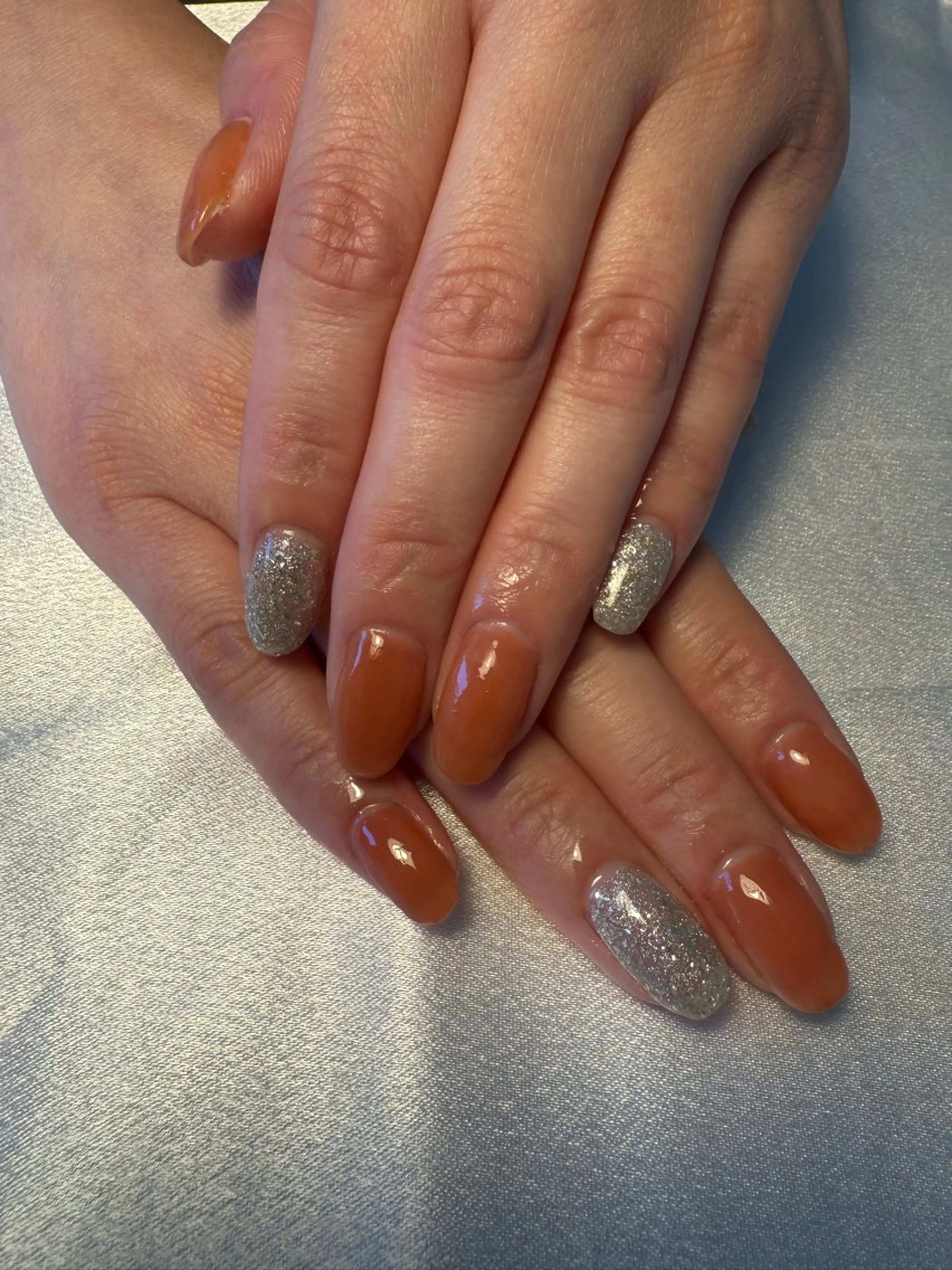 ネイル キラキラネイル ラメ(グリッター) オレンジ シルバー 夏ネイル nail salon Estelleのネイルデザイン