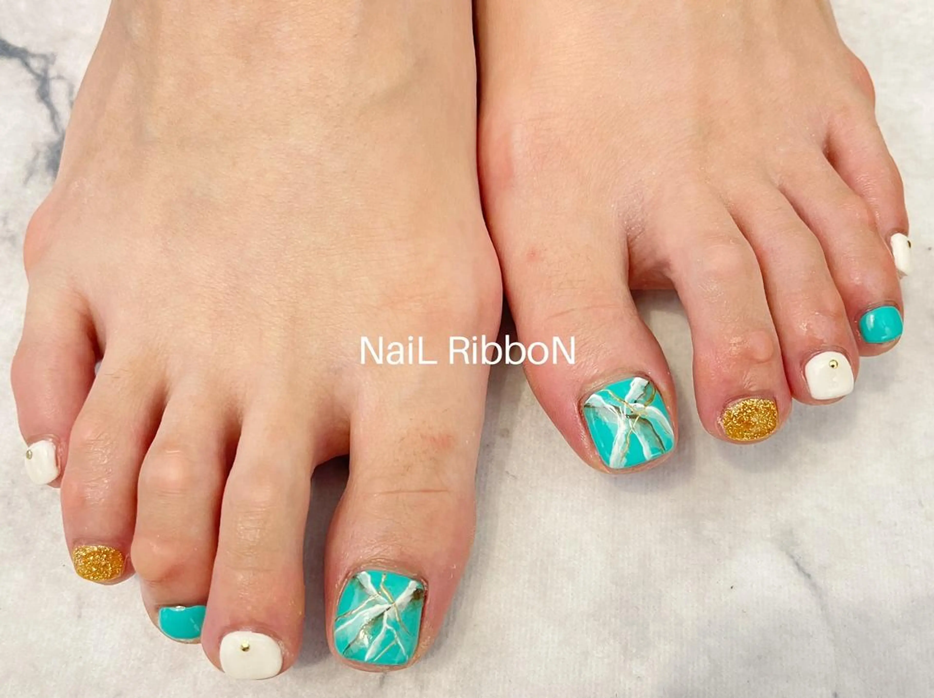 ネイル ネイルリボン 受付スタッフのネイルデザイン