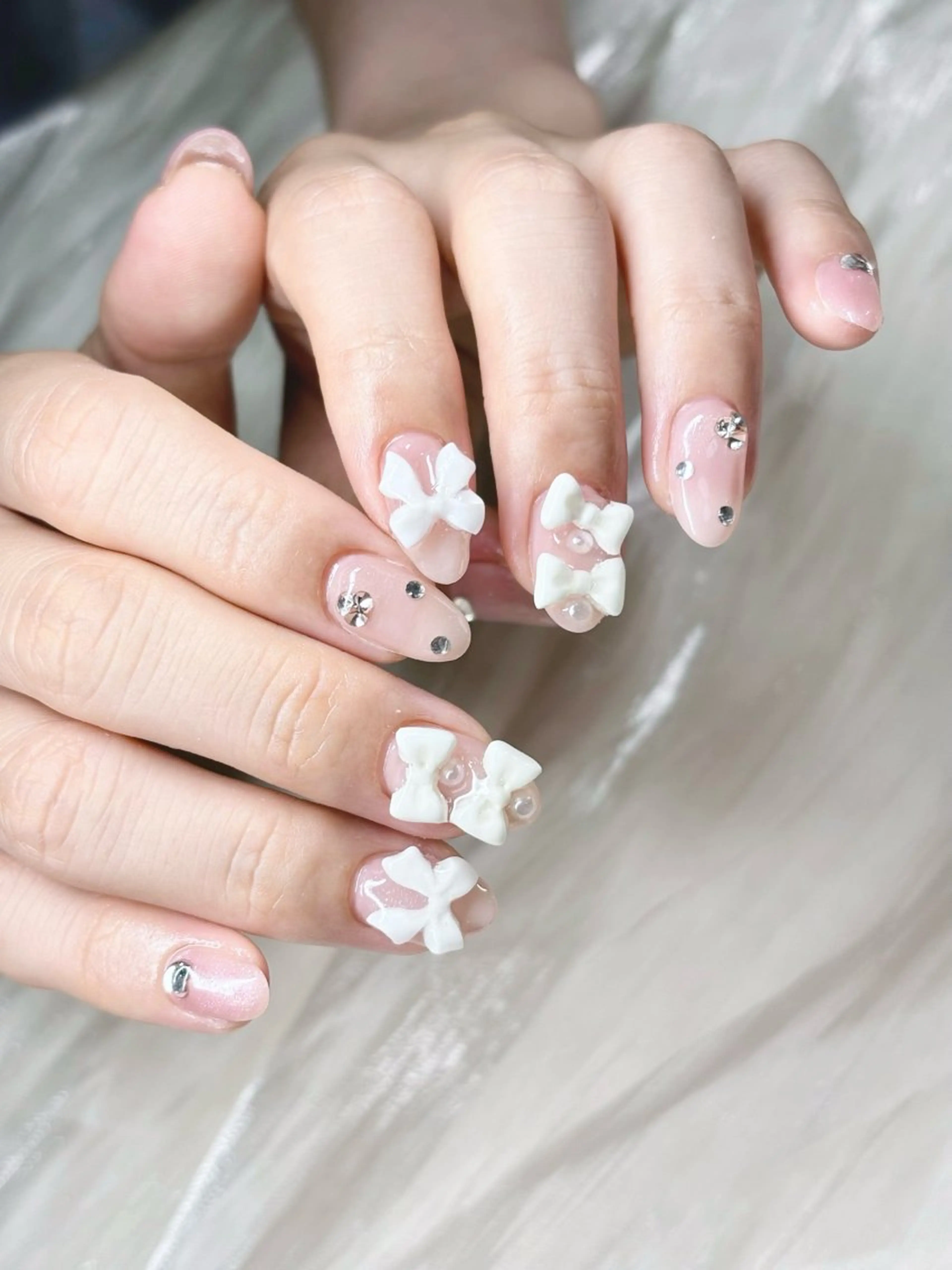 ネイル ピンク リボン ワンホンネイル ETE LUNA NAILのネイルデザイン