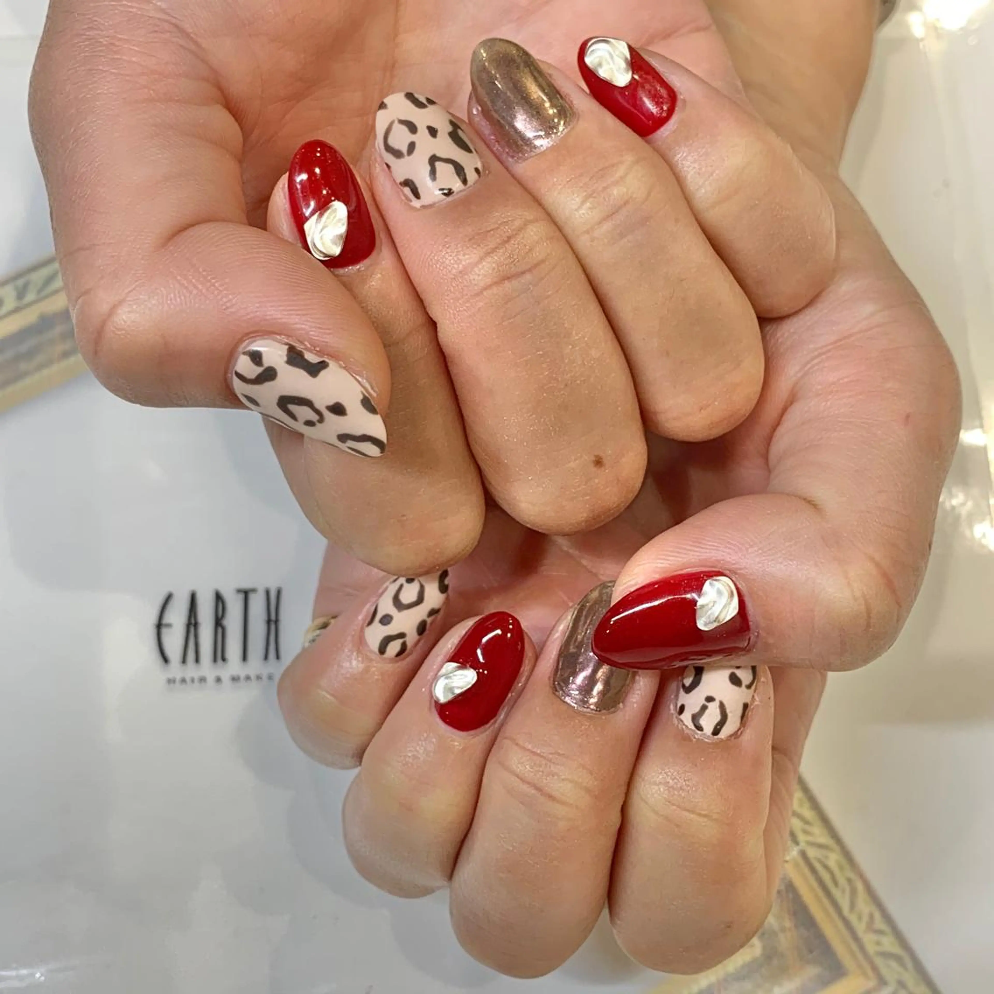 ネイル アニマル柄 赤色 ハンドネイル 佐藤 まりえのネイルデザイン