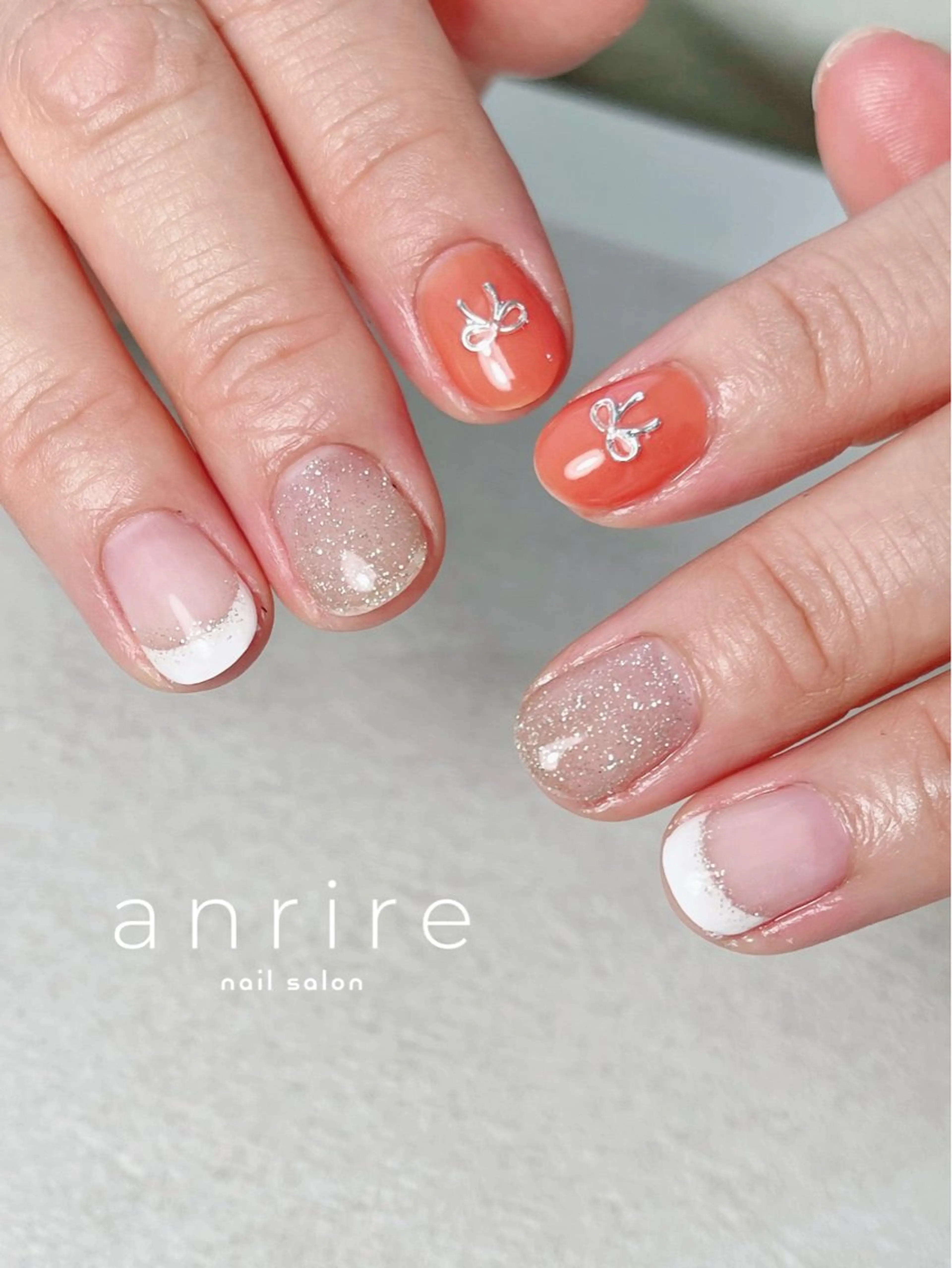 ネイル フレンチネイル ジェルネイル キラキラネイル ラメ(グリッター) オレンジ ハンドネイル nailsalon anrireのネイルデザイン
