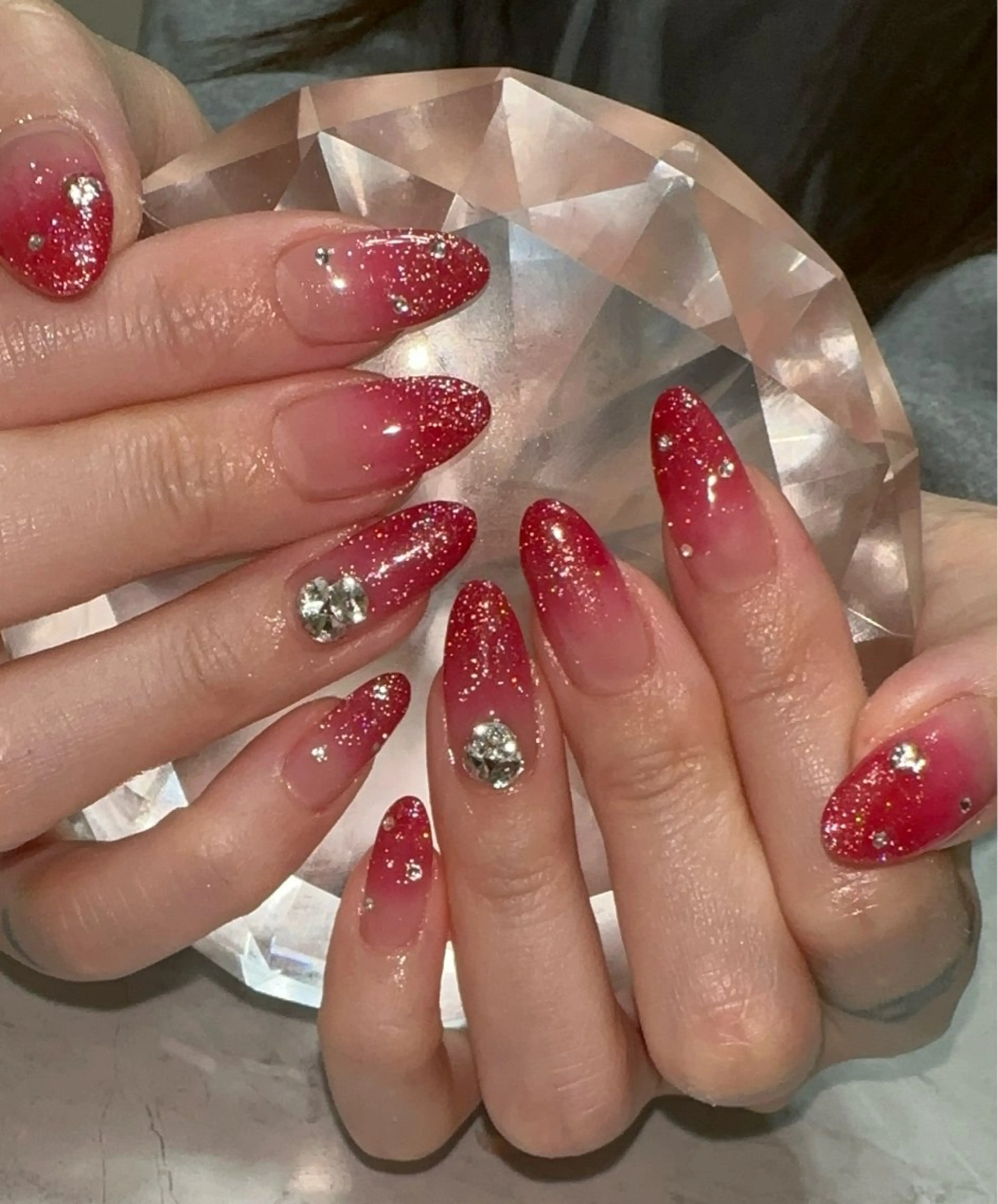 ネイル フラッシュネイル グラデーション キラキラネイル 赤色 ハンドネイル with nail.のネイルデザイン