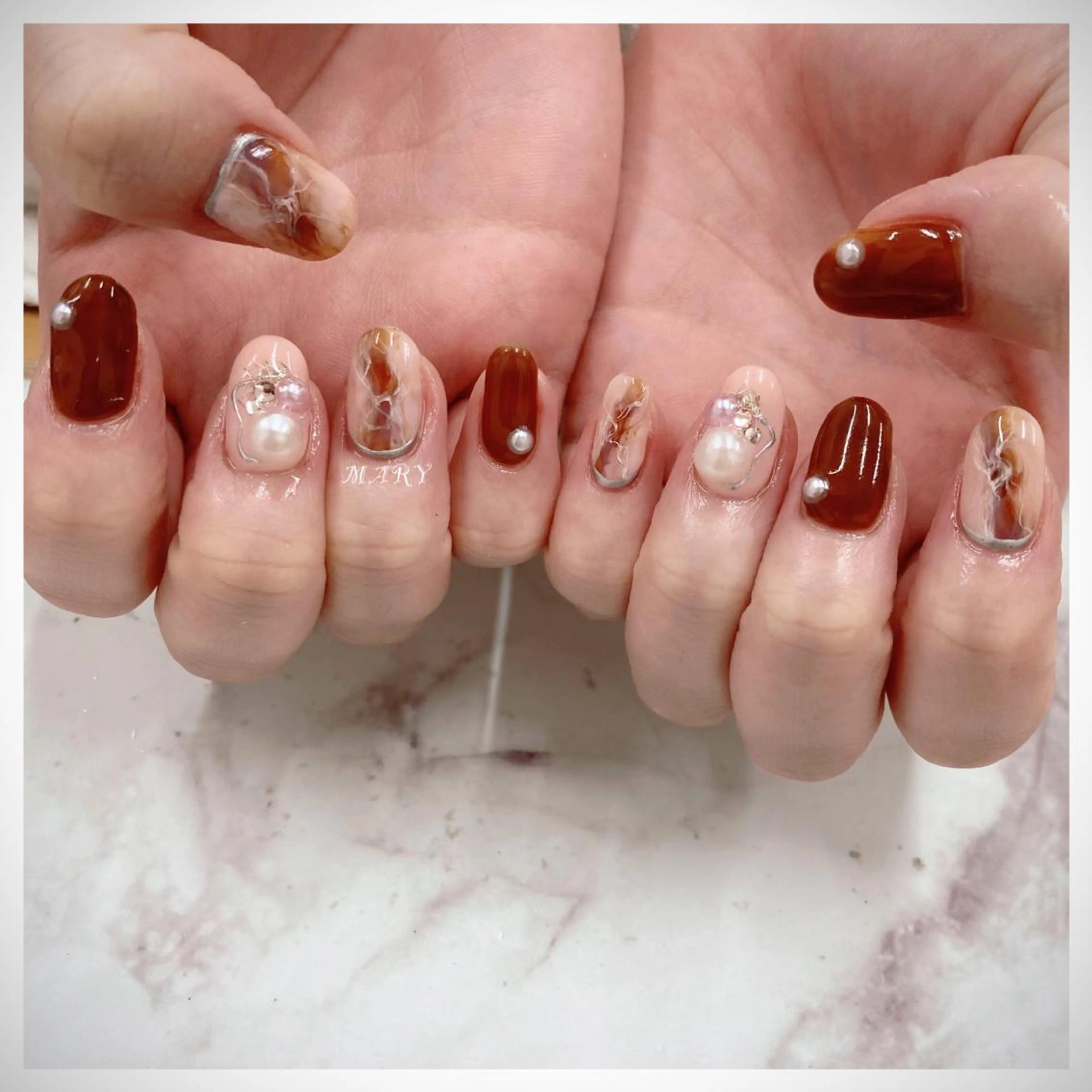 ネイル ブラウン 大理石ネイル(マーブル) ニュアンスネイル ワンカラーネイル ピンク ハンドネイル Mary nail .narumiのネイルデザイン