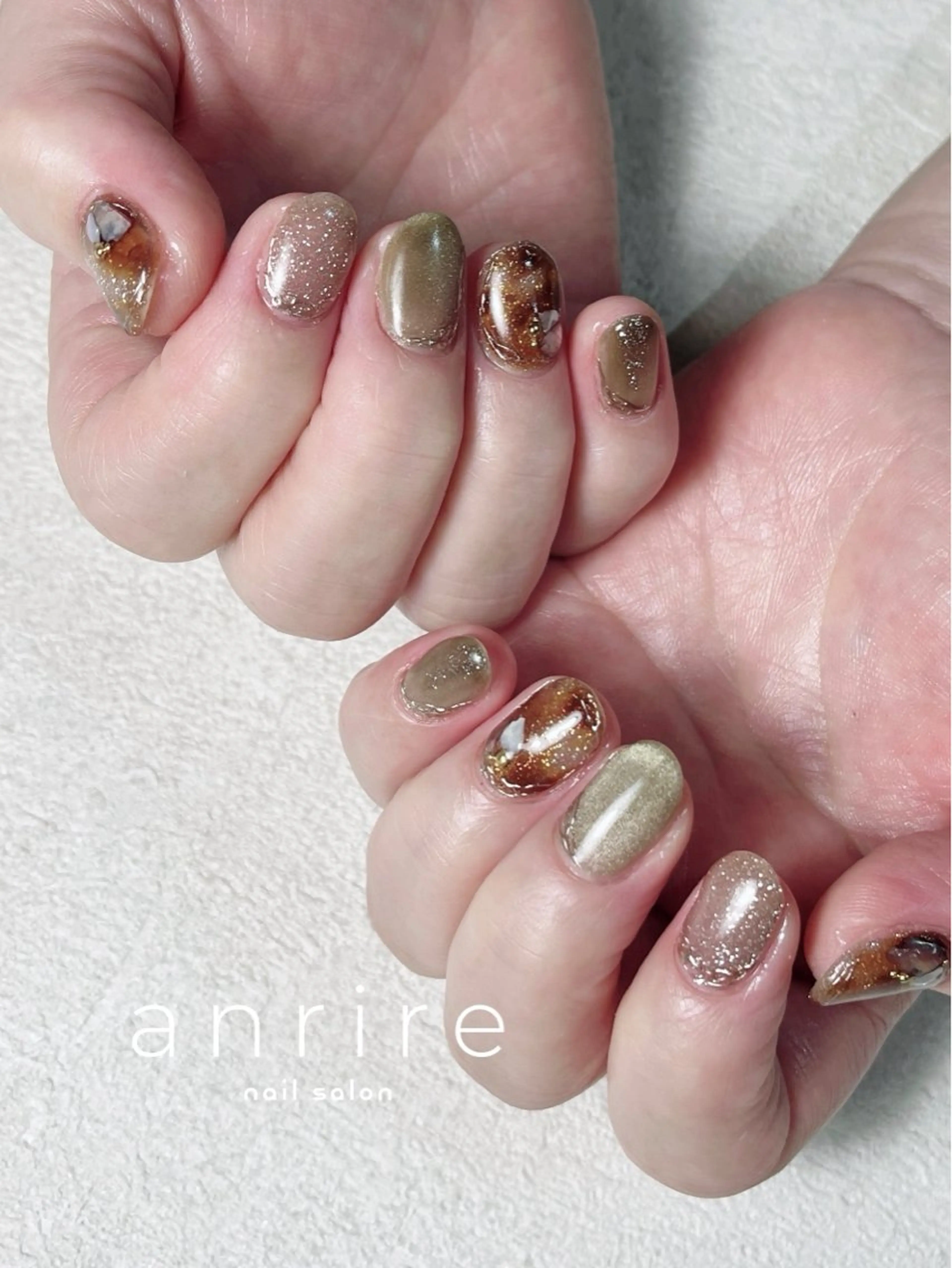 ネイル べっ甲ネイル ブラウン フラッシュネイル ジェルネイル キラキラネイル ハンドネイル nailsalon anrireのネイルデザイン