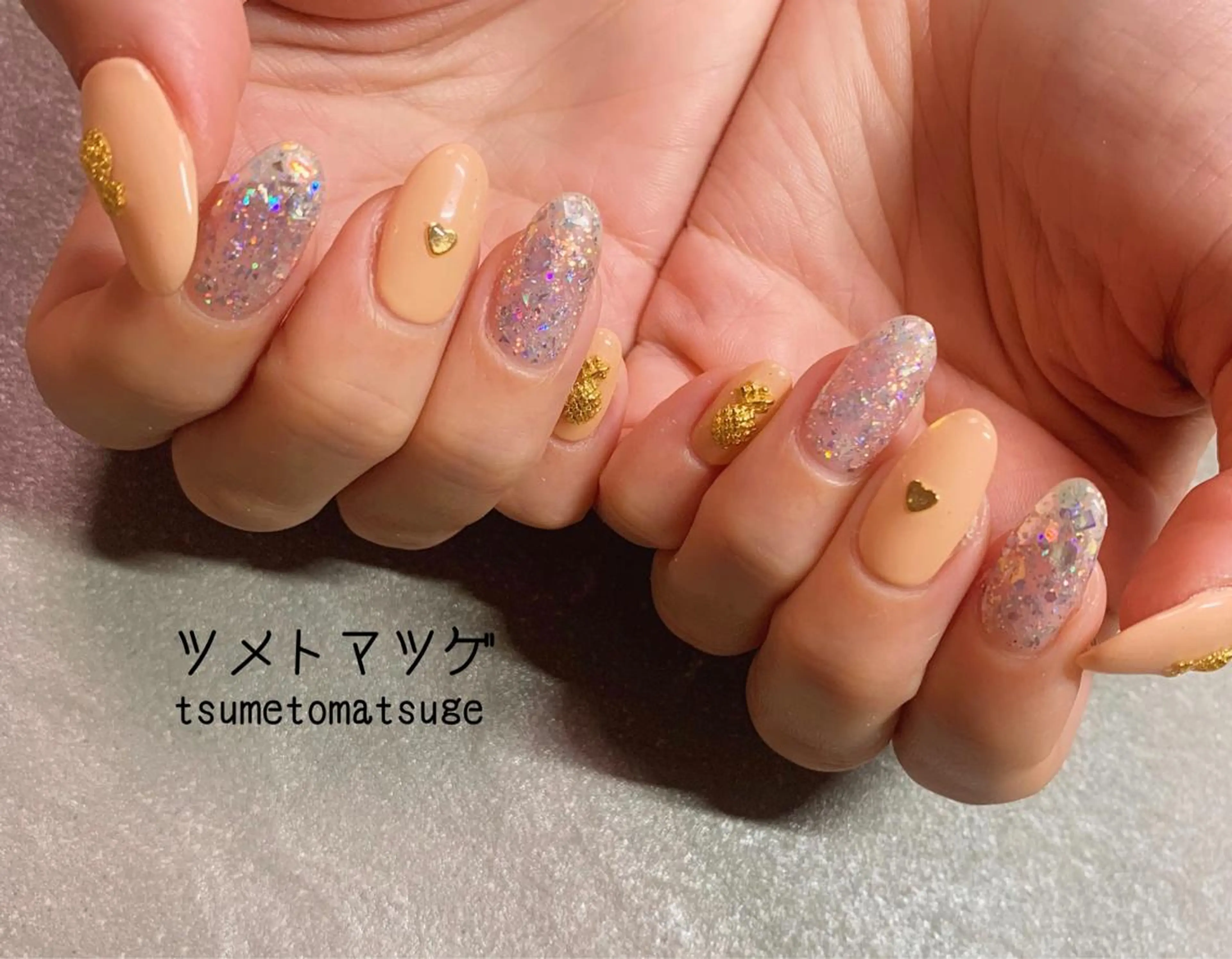 ミディアム ネイル ハンドネイル ツメトマツゲ .のネイルデザイン