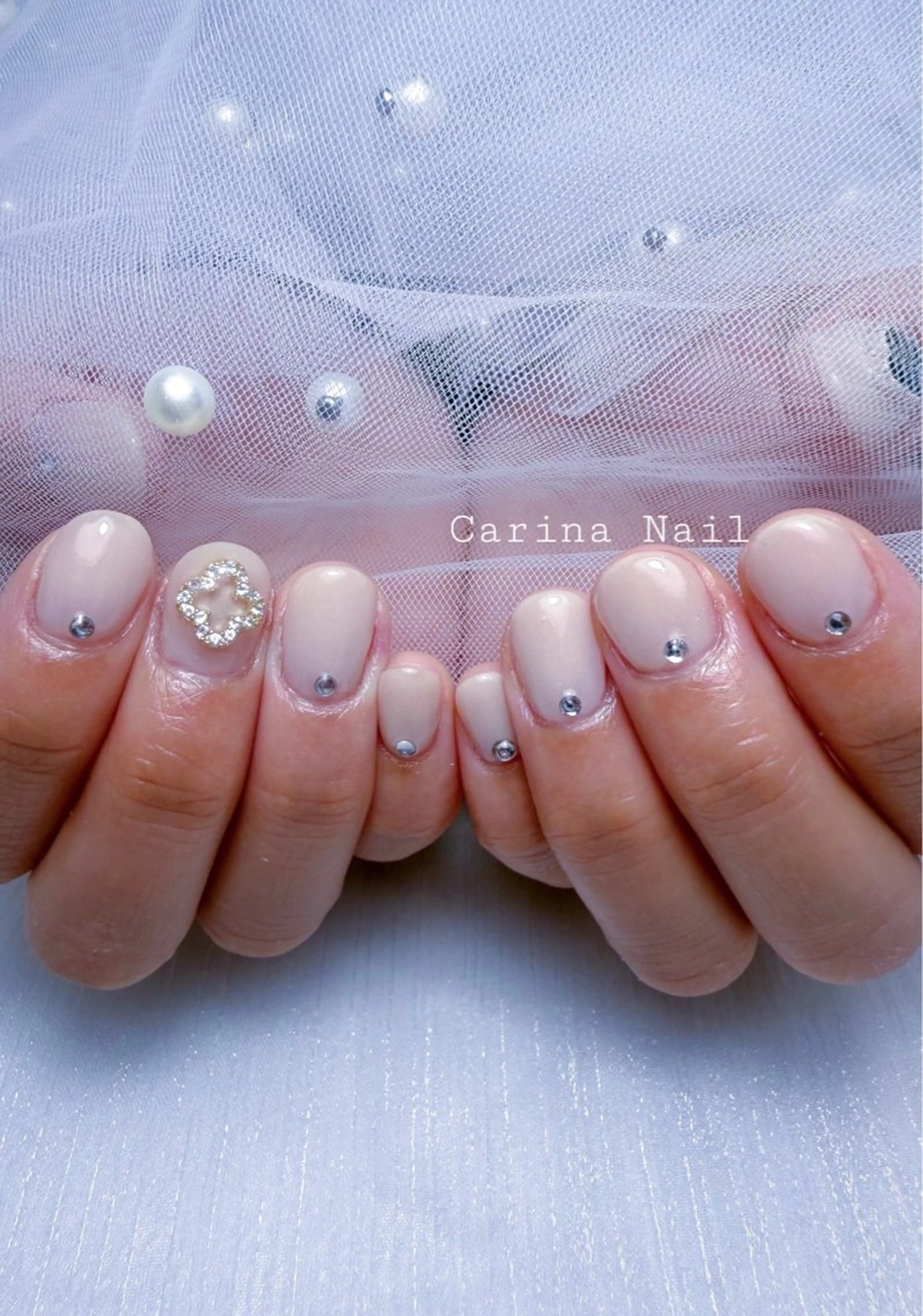 ネイル ガーリー ストーンネイル Carina Nailのネイルデザイン