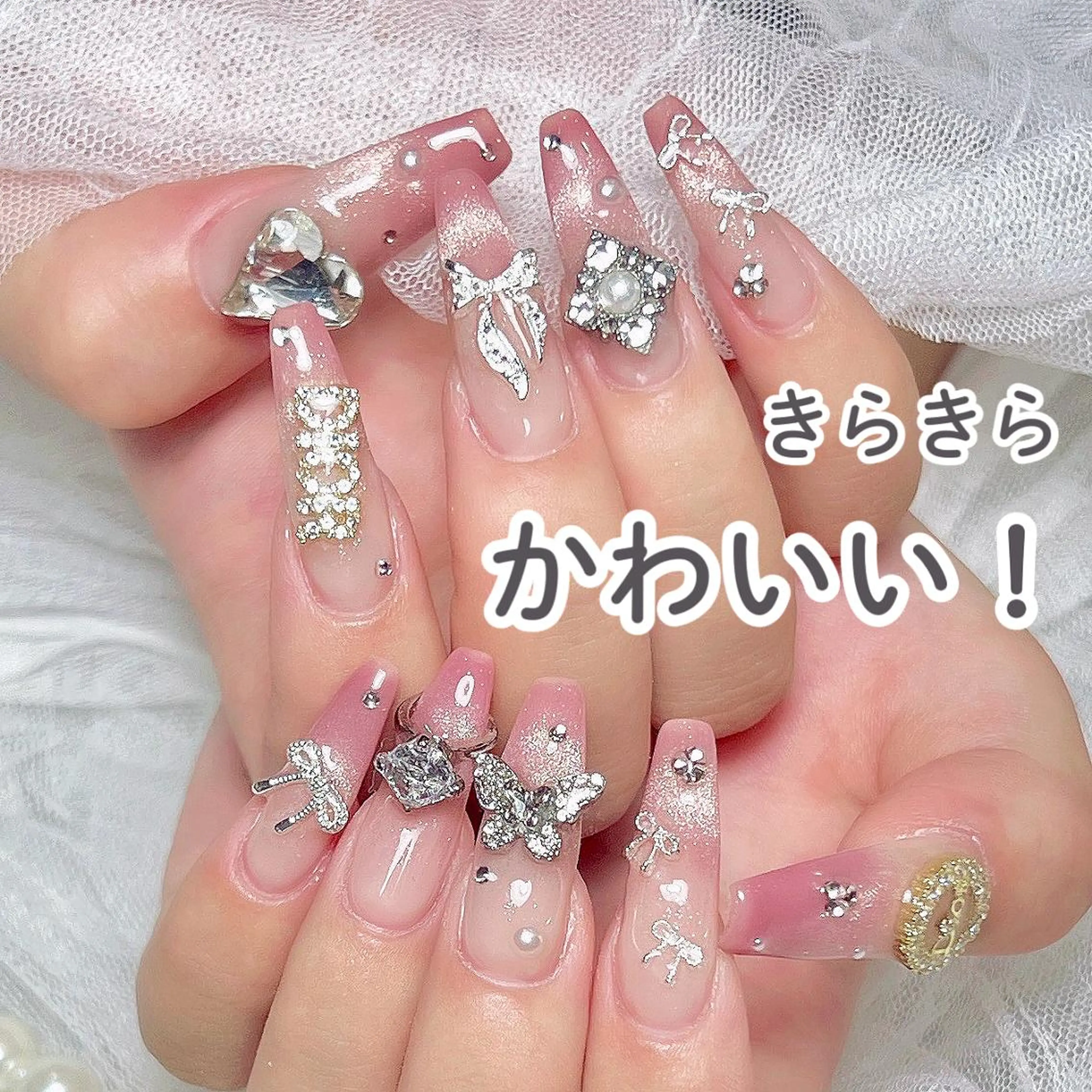 ネイル アートネイル カジュアル ハート ホログラムネイル ロングネイル ハンドネイル ハンドケア ナユキNA.YUKI 北千住店のネイルデザイン