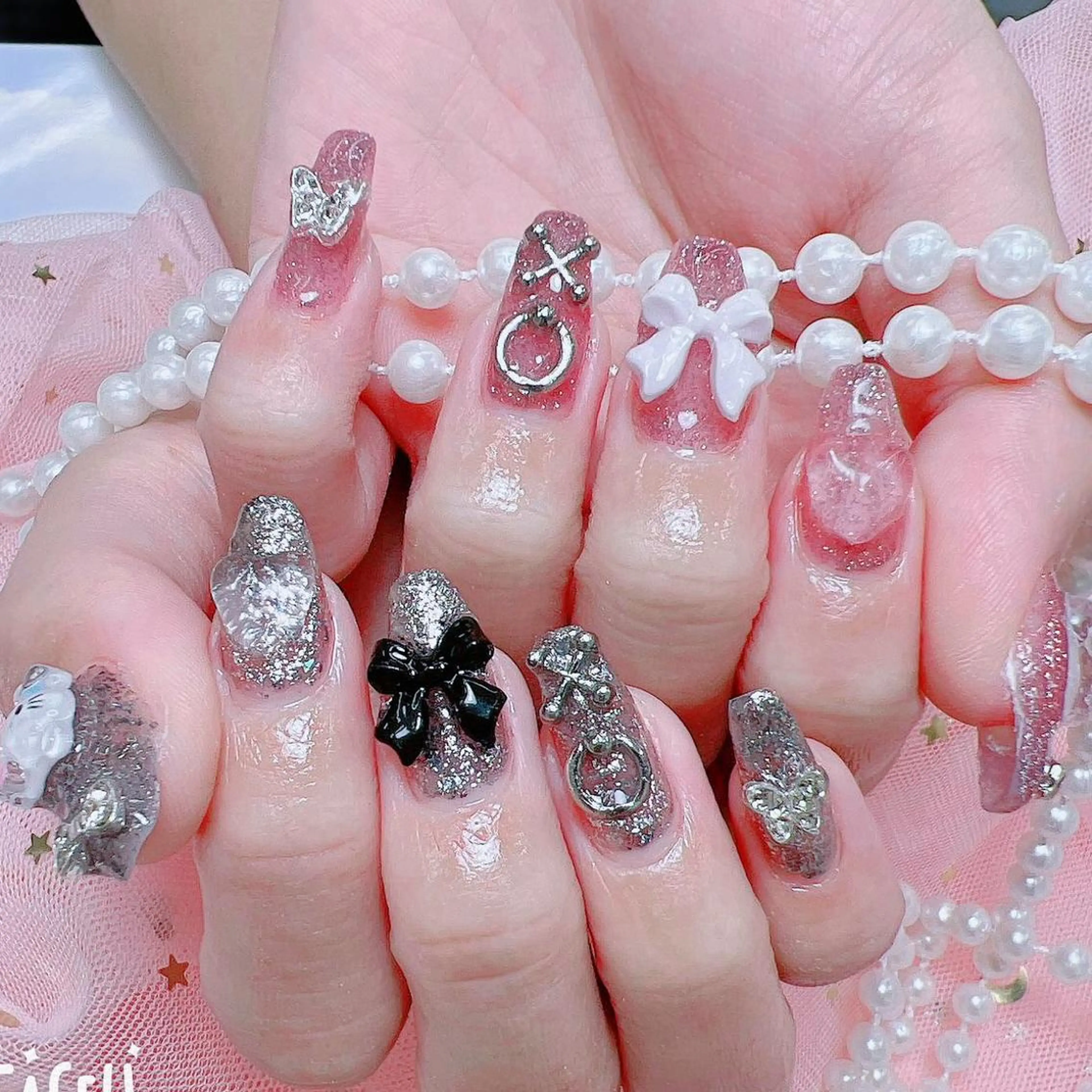 ネイル 🎀まゆ 🪽🐾のネイルデザイン