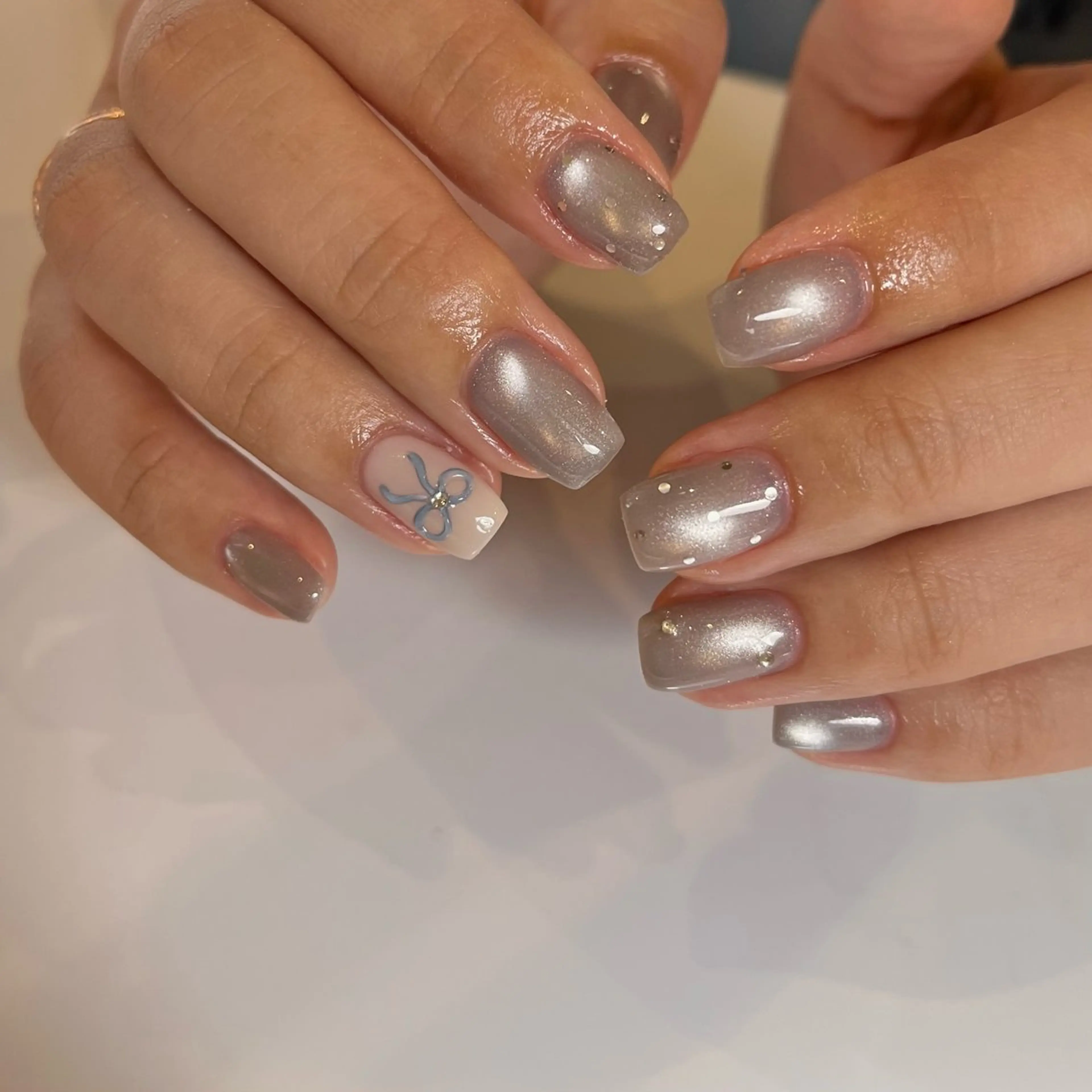 ネイル アートネイル 水色 リボン ハンドネイル ballie／小野原 なつみのネイルデザイン