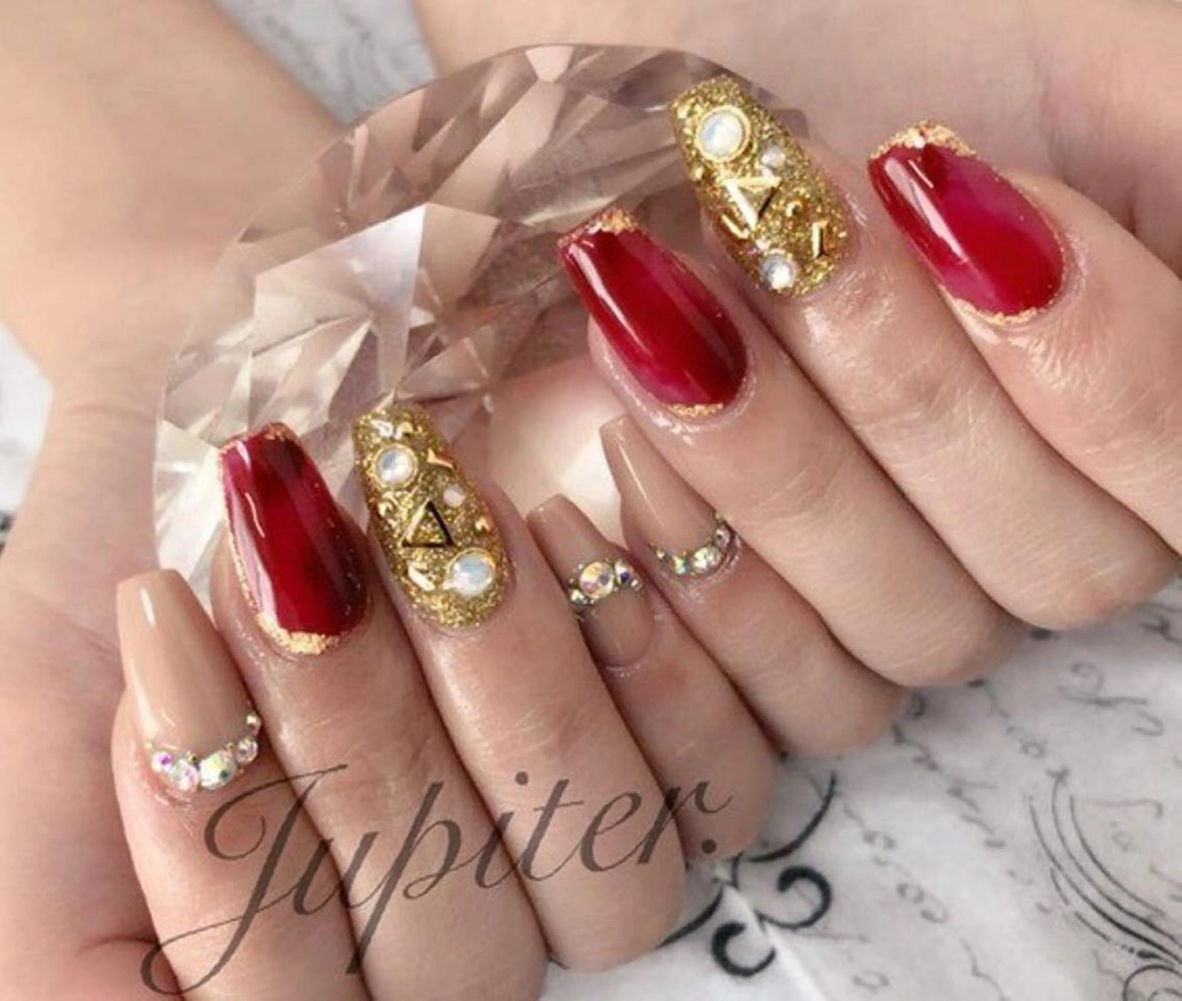 ネイル べっ甲ネイル 赤色 PrivateSalon Jupiter所属・Jupiter .のネイルデザイン