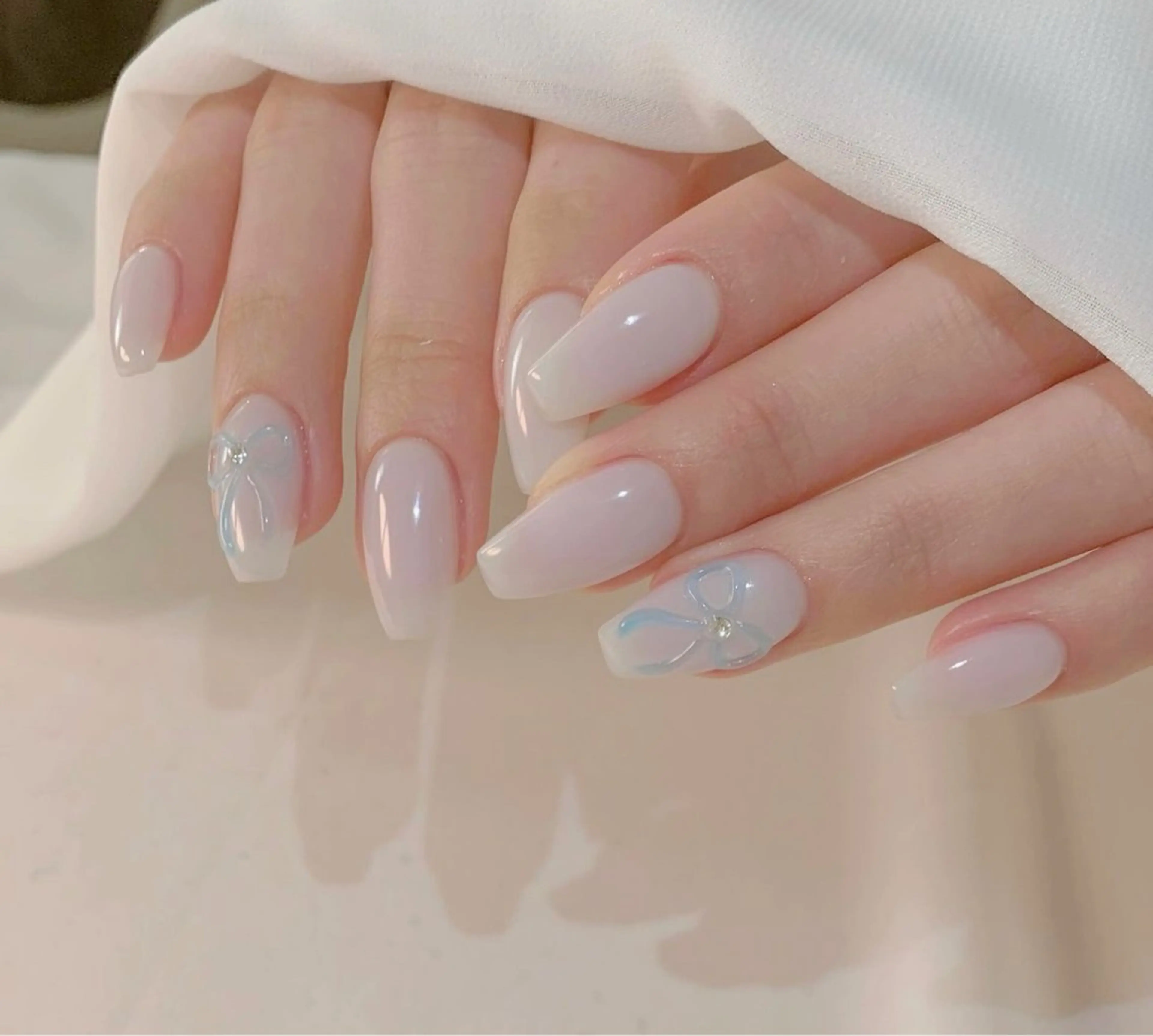 ネイル ワンカラーネイル リボン ハンドネイル Floria nail salonのネイルデザイン