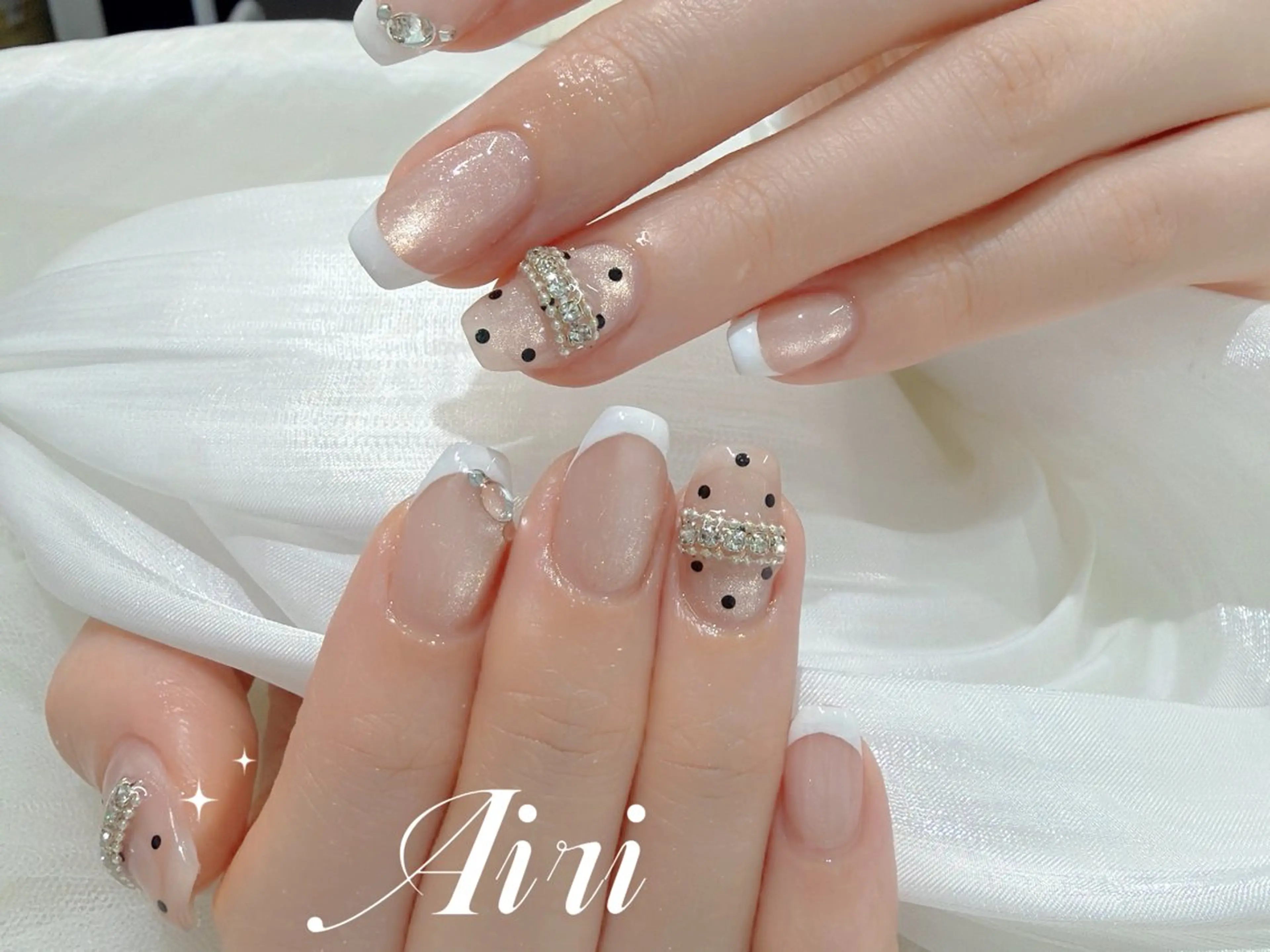 ネイル ハンドネイル ネイルサロンAiri 長さ出し·シンプルのネイルデザイン