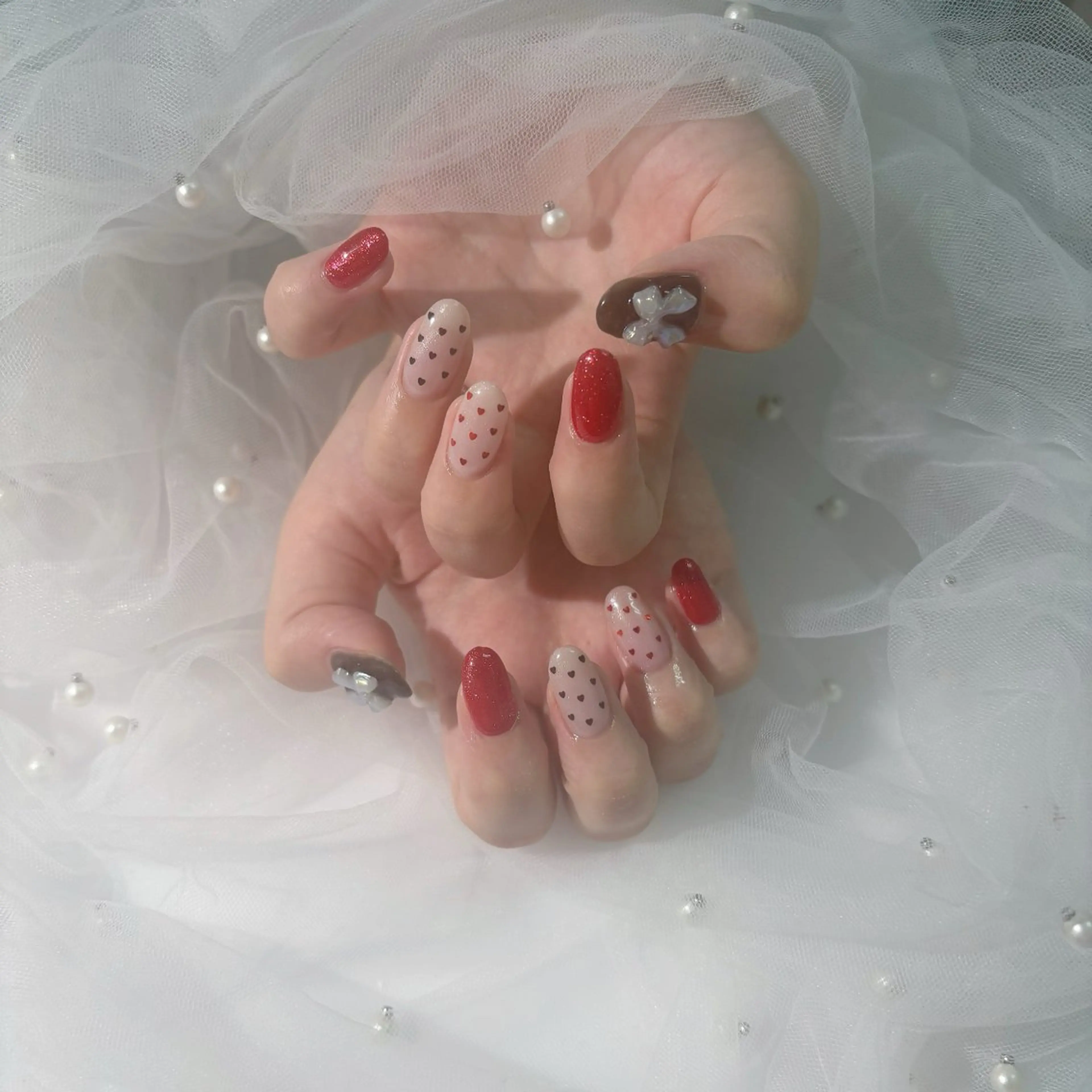 ネイル リボン ハンドネイル ひな🍒 Y's beautyのネイルデザイン