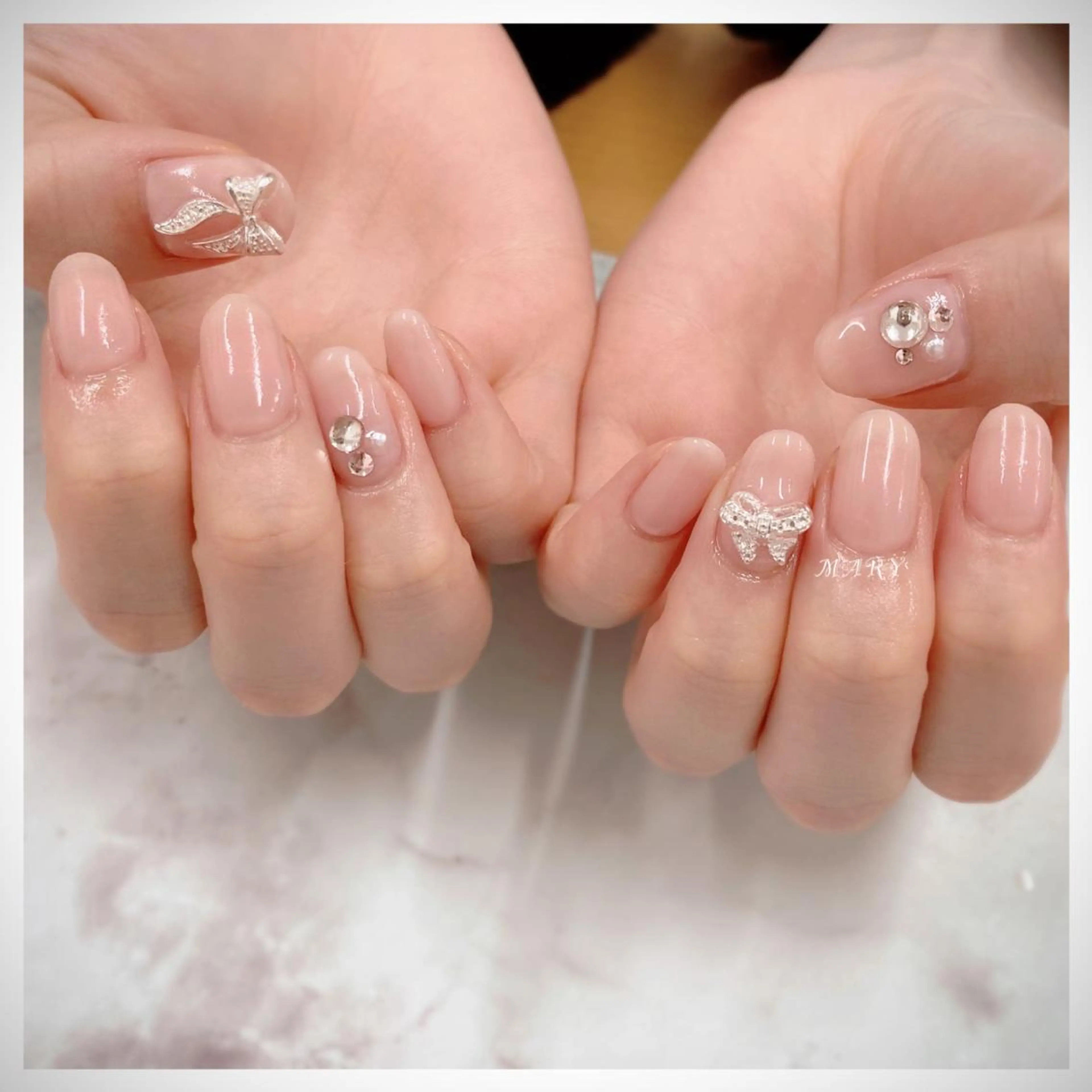 ネイル ニュアンスネイル ワンカラーネイル ピンク リボン ハンドネイル Mary nail .narumiのネイルデザイン