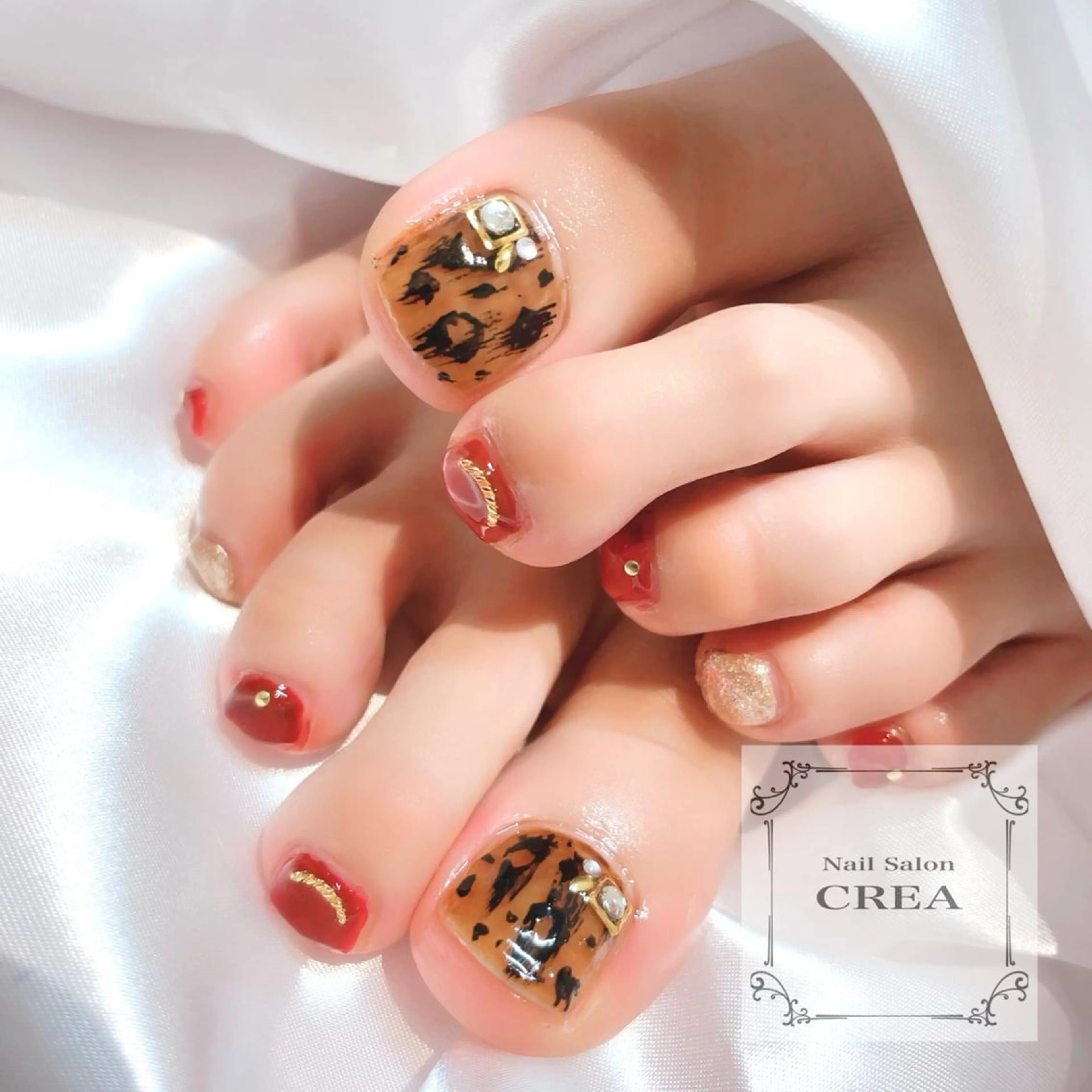 ネイル アニマル柄 ボルドー フットネイル フットネイル NailSalon CREAのネイルデザイン