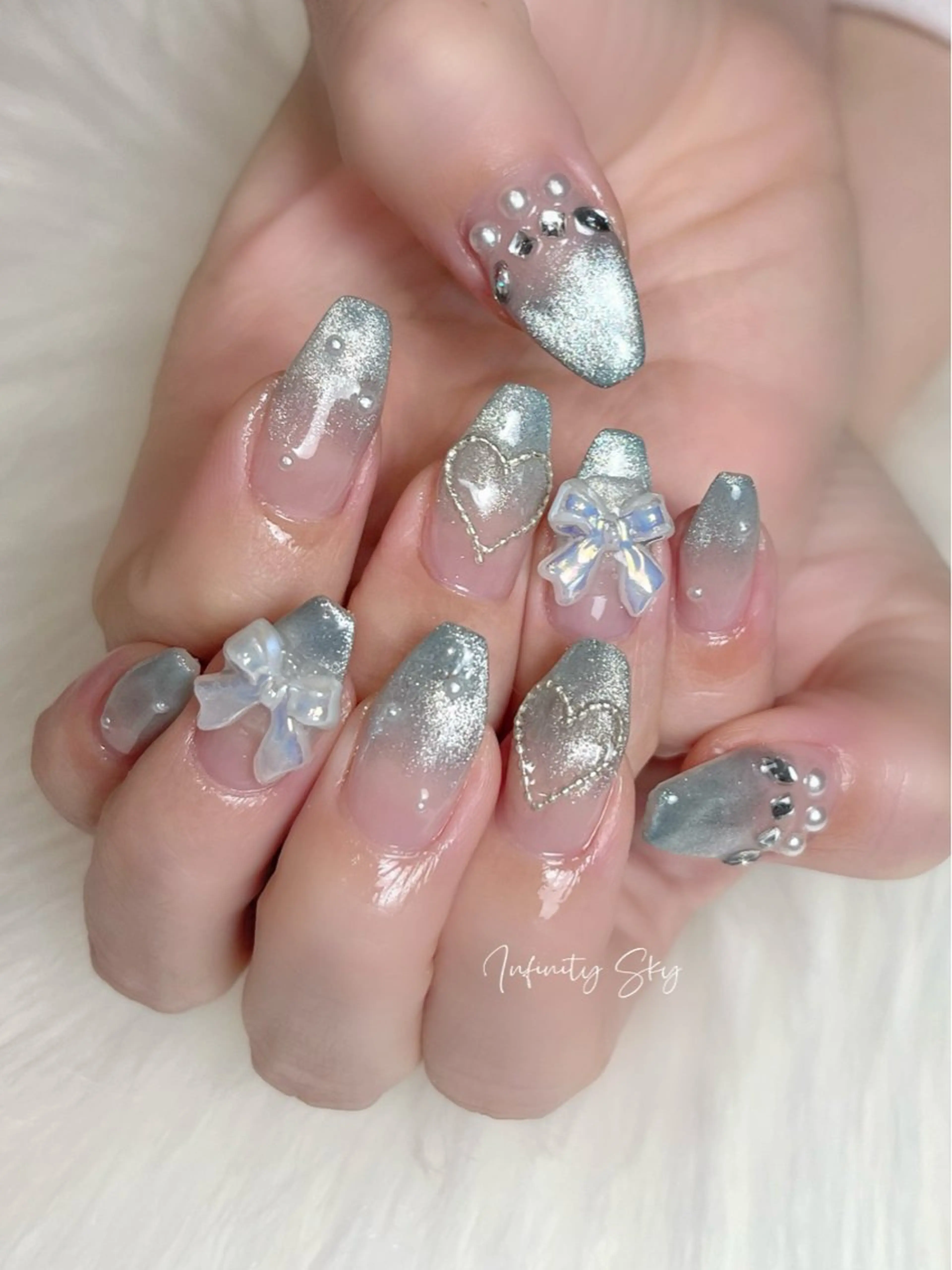 ネイル ブルー ハート リボン ハンドネイル infinity skyのネイルデザイン
