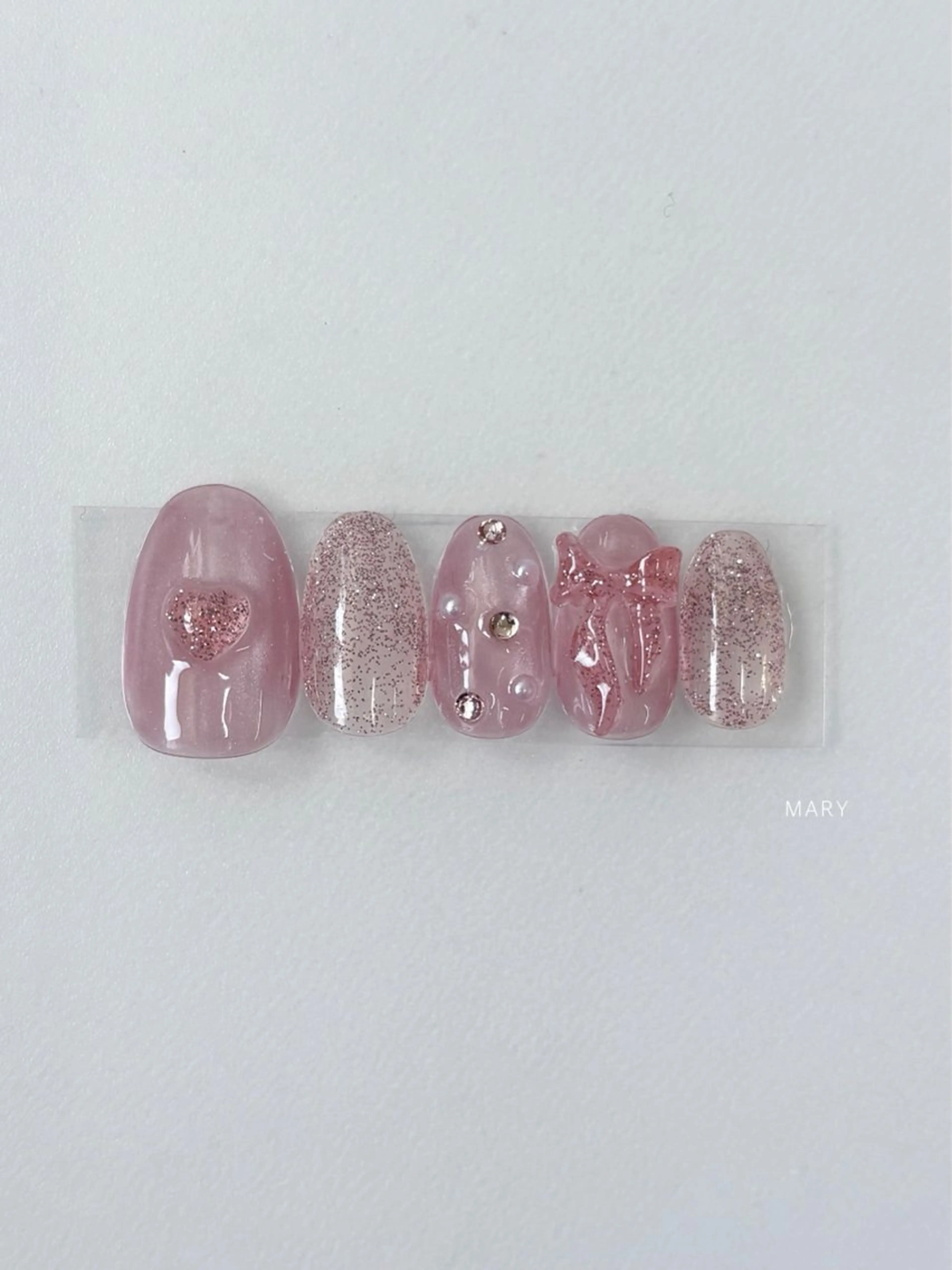 ネイル フラッシュネイル マグネットネイル ピンク リボン 春ネイル ハンドネイル Mary nail所属・Mary nail .narumiのネイルデザイン