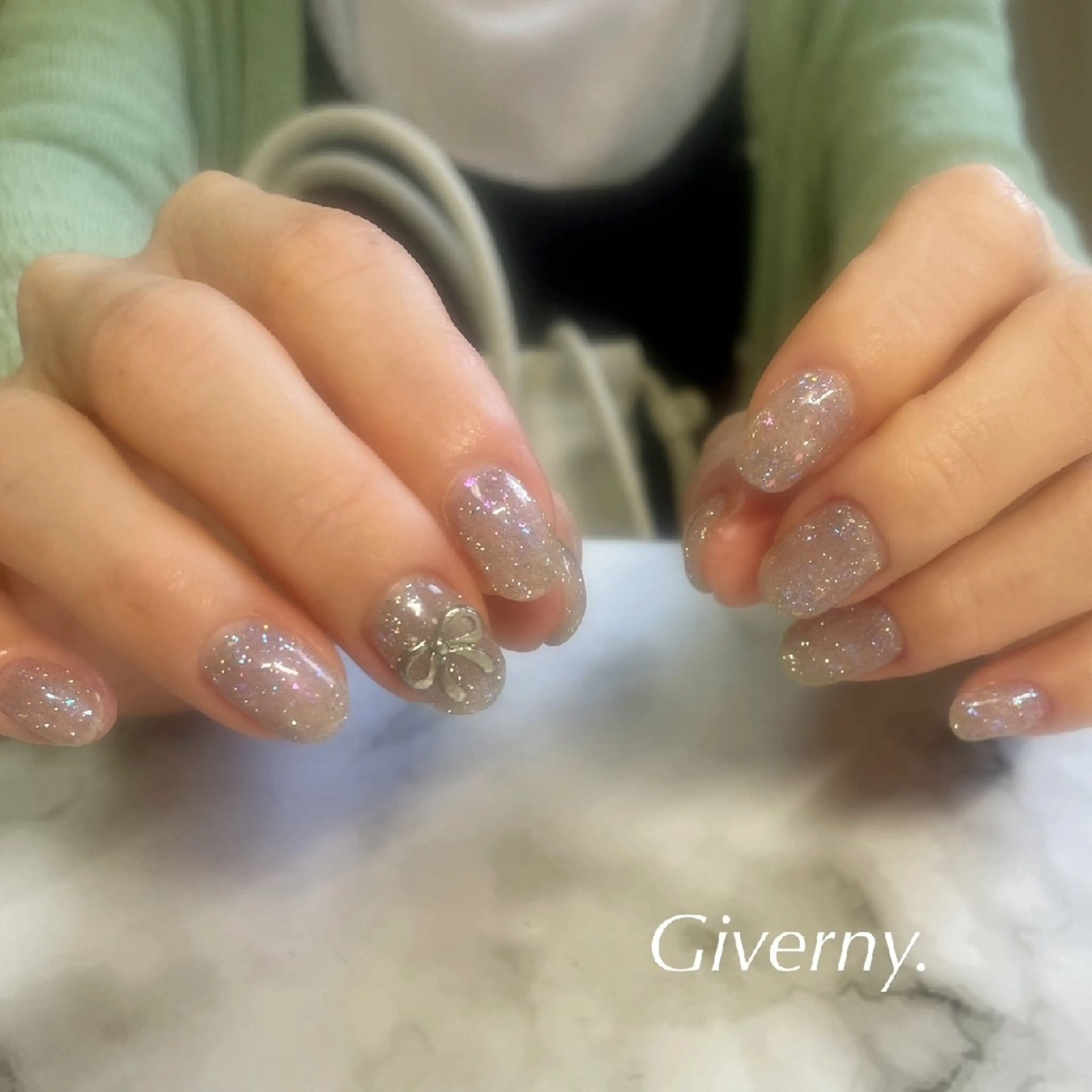 ネイル フラッシュネイル キラキラネイル リボン 春ネイル ハンドネイル Giverny .のネイルデザイン