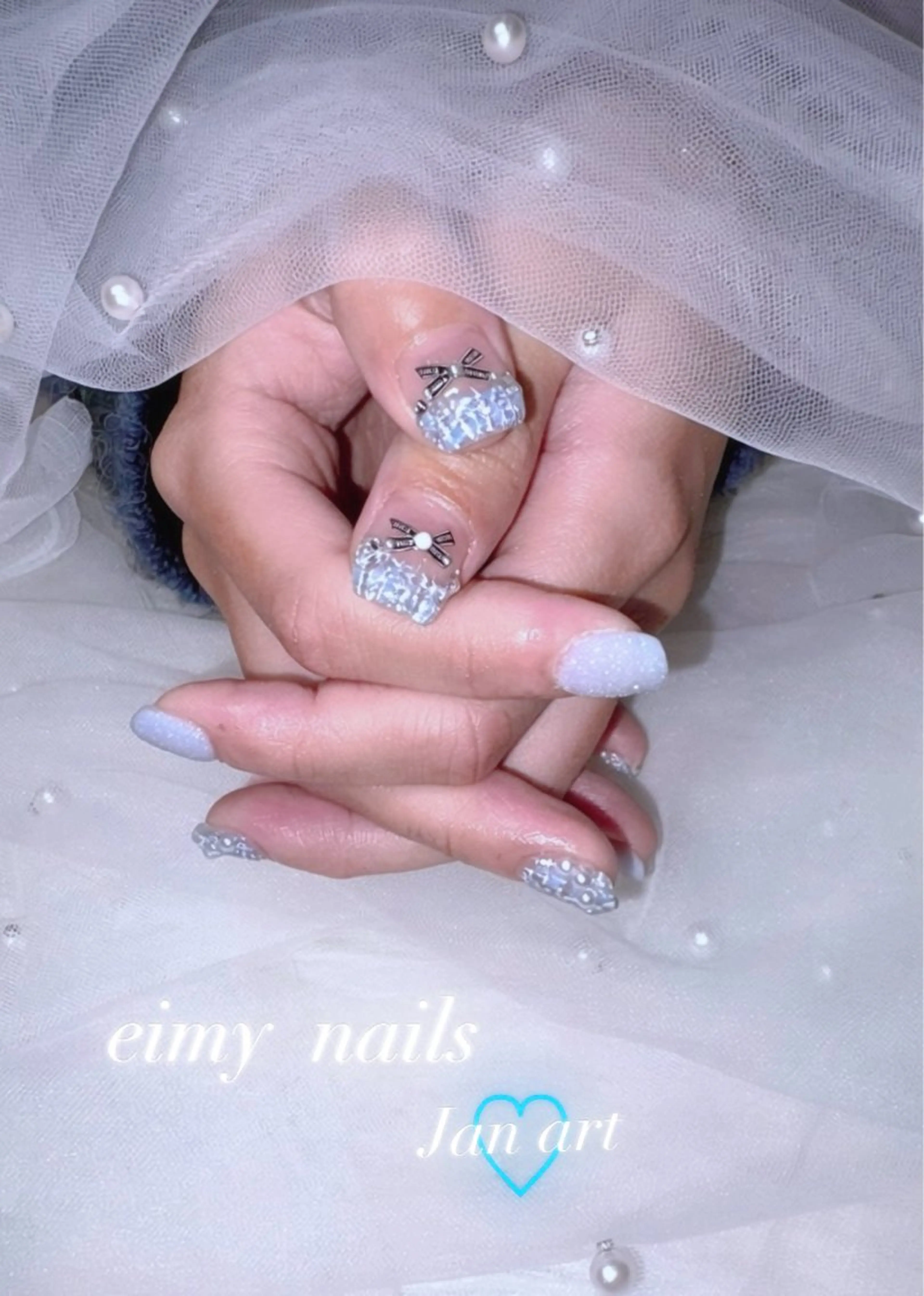 ネイル アートネイル フレンチネイル 水色 リボン ツイードネイル ハンドネイル eimy nails♡のネイルデザイン