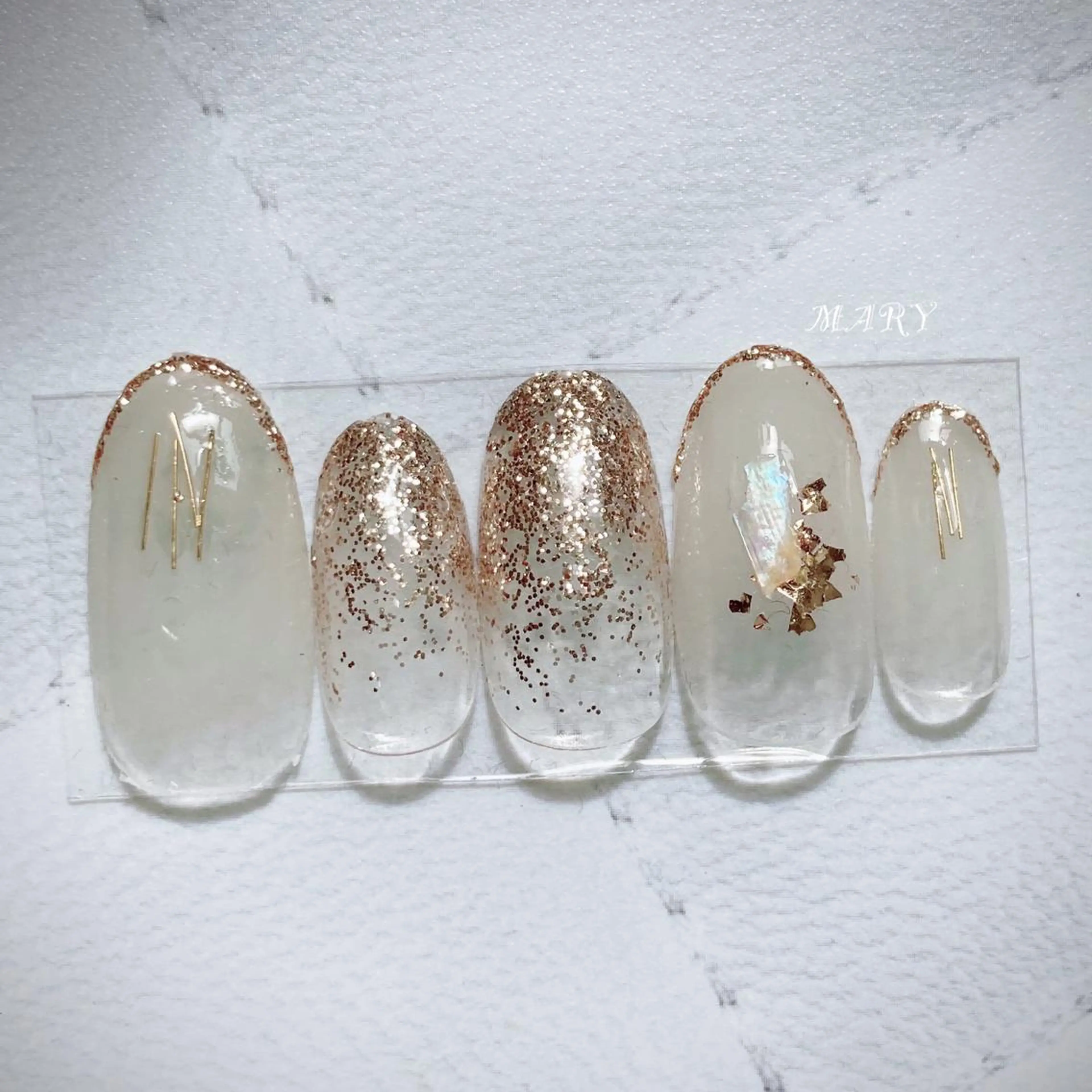 ネイル ゴールド グラデーション キラキラネイル ニュアンスネイル ハンドネイル Mary nail .narumiのネイルデザイン