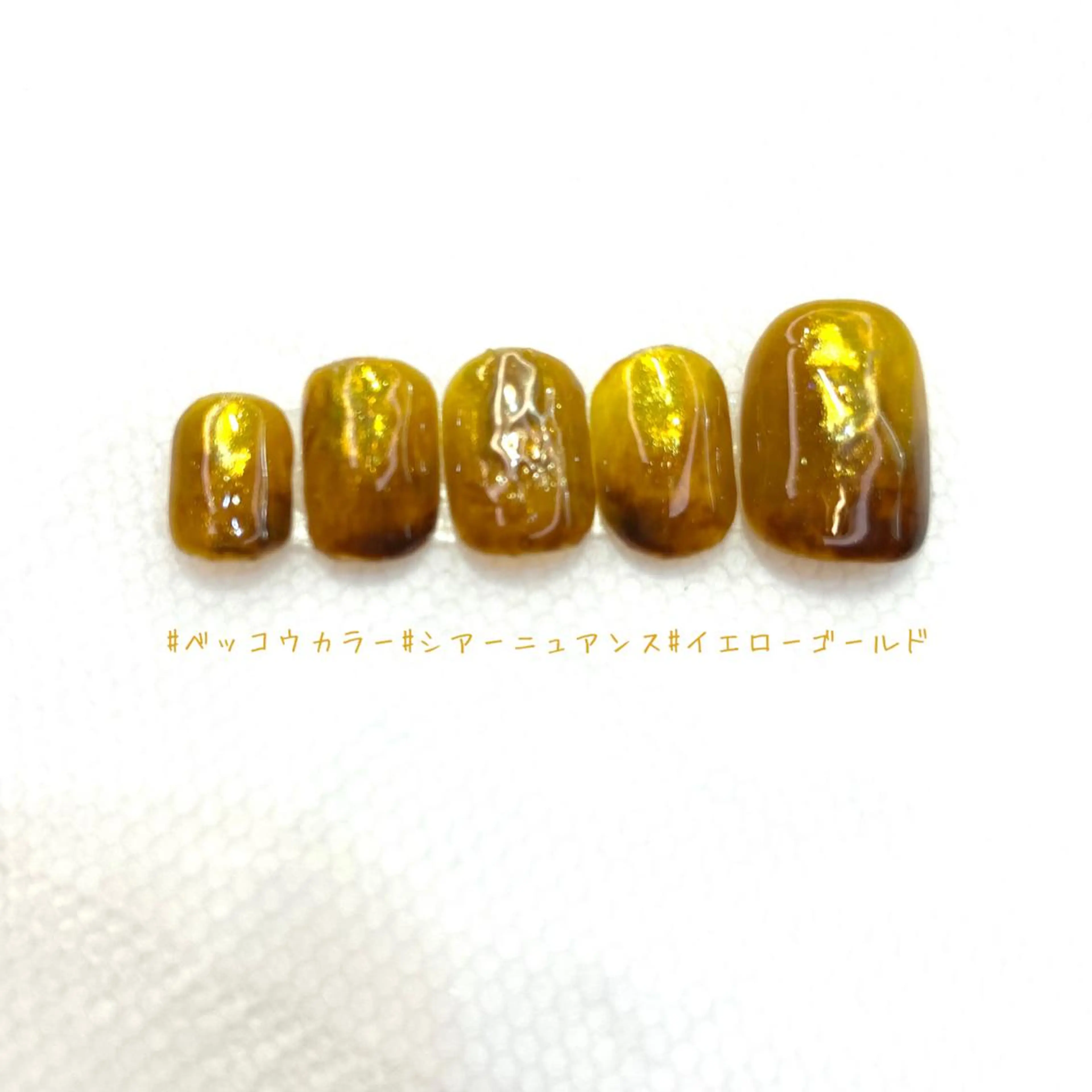 ネイル ブラウン ゴールド 黄色 nailbios .tomo.のネイルデザイン