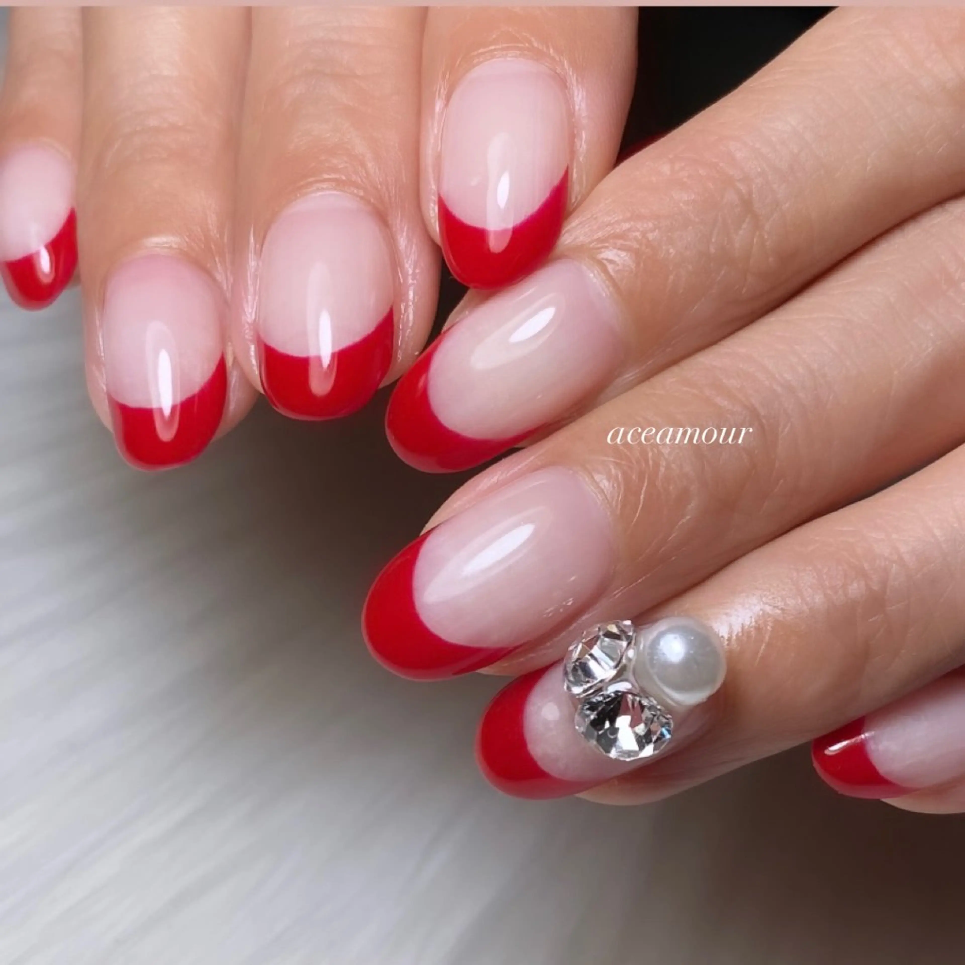 ネイル フレンチネイル 赤色 ネイル/耳つぼ /新ホワイトニングのネイルデザイン