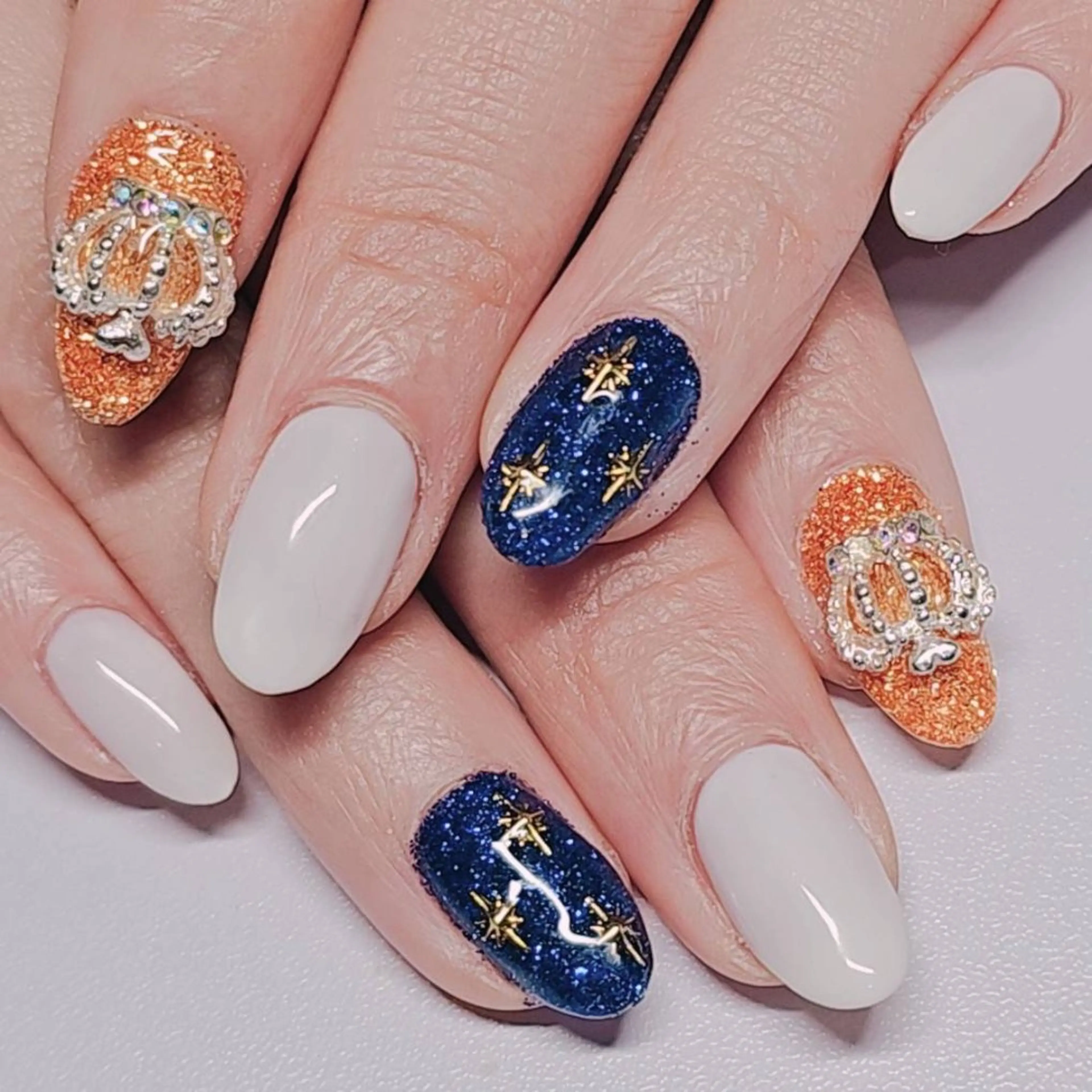 ネイル ラメ(グリッター) ネイビー オレンジ ハンドネイル よしだ ひろきのネイルデザイン