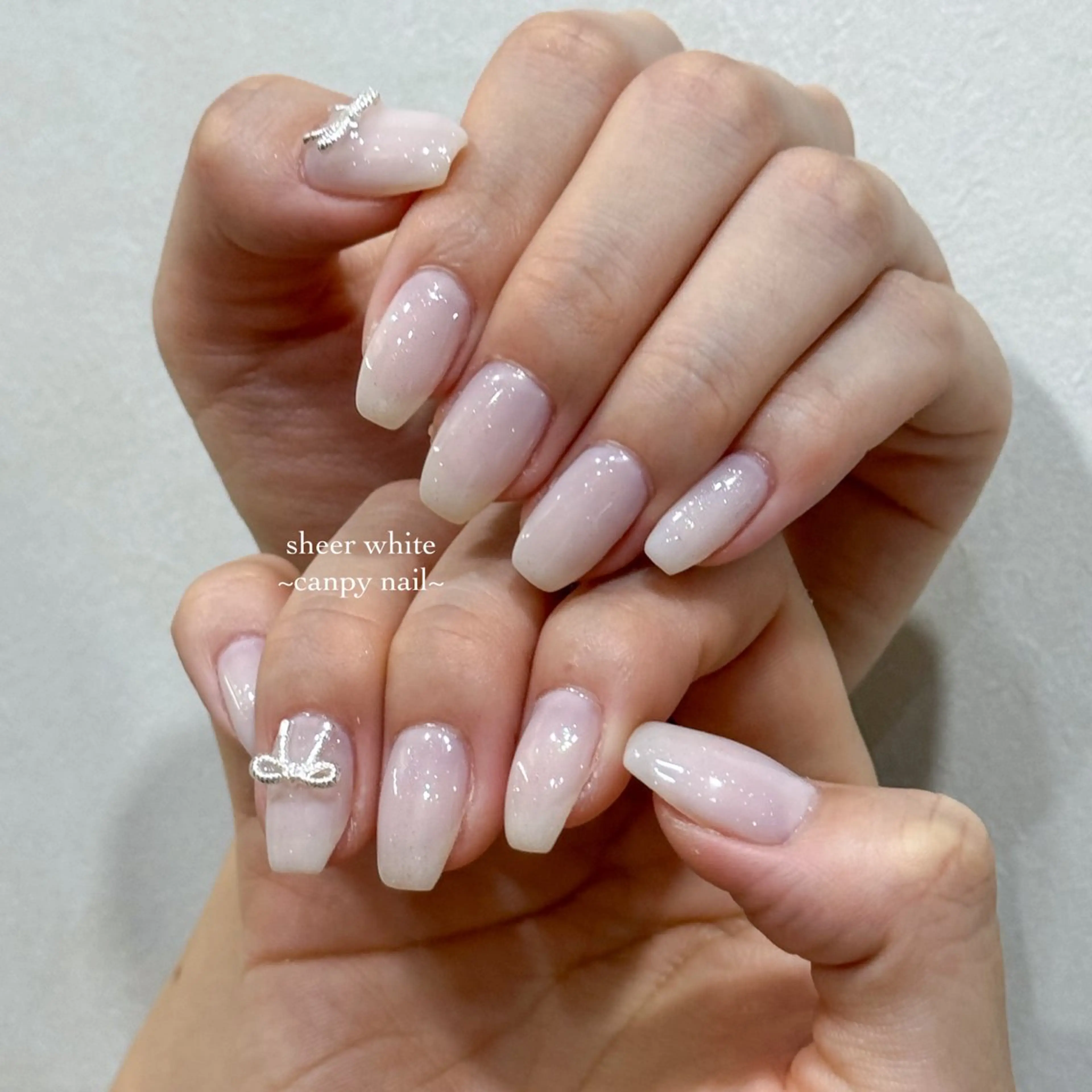 ネイル ワンカラーネイル リボン ホワイト ハンドネイル 韓国ネイル/ワンホン ネイル🎀表参道3分のネイルデザイン