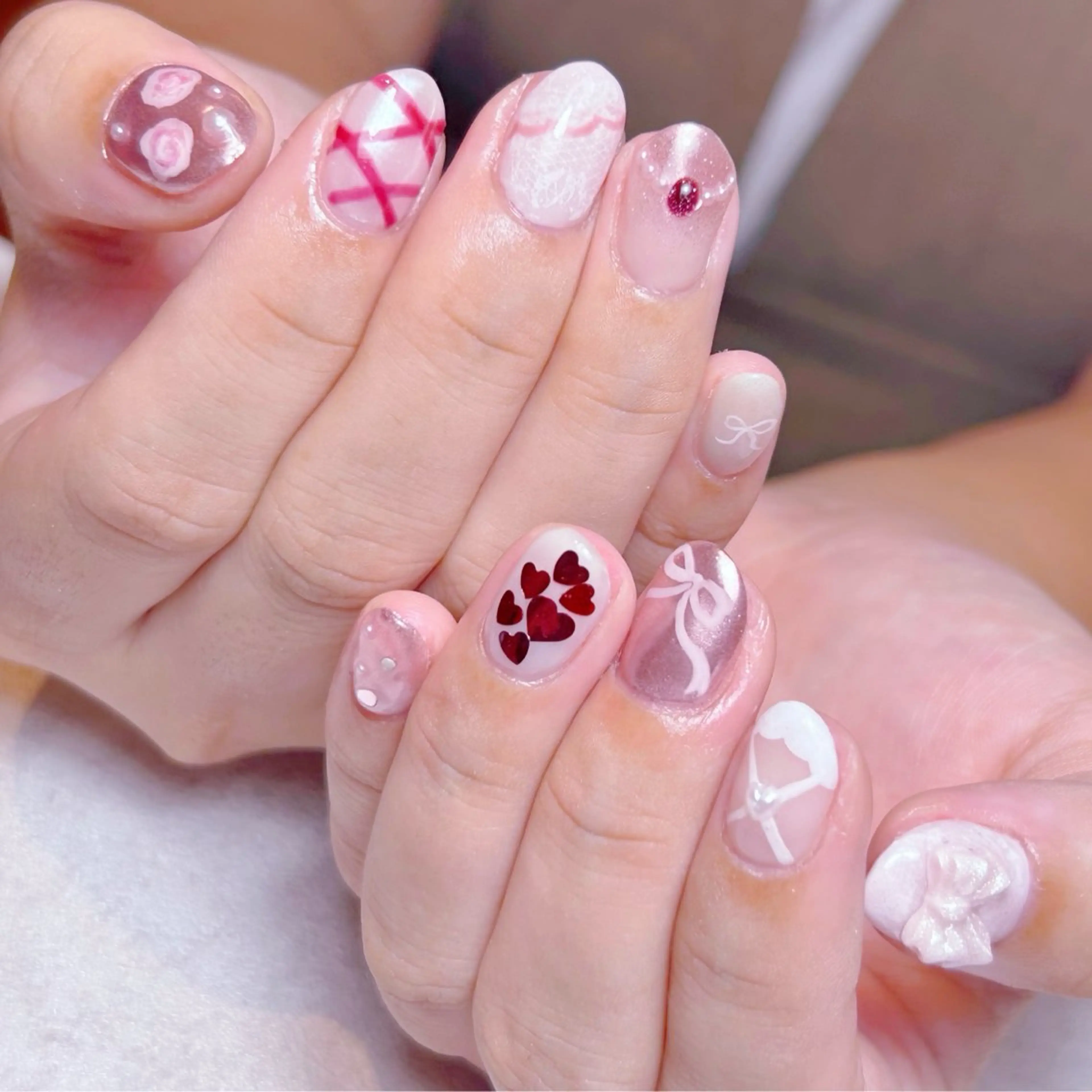 ネイル ガーリー ピンク リボン ハンドネイル raku  nail 浦和店 【ラクネイル】所属・m Natsume.のネイルデザイン