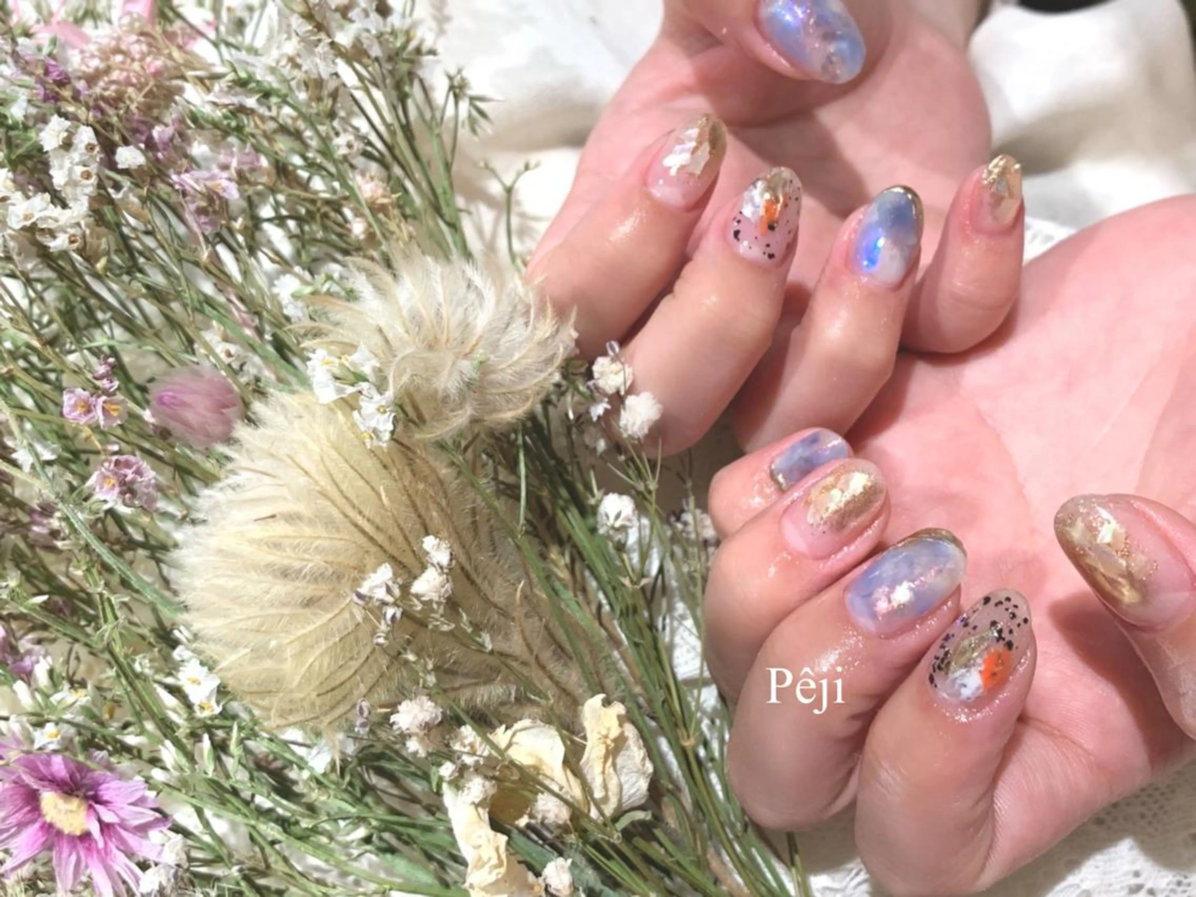 ショート m kaori𓃟のネイルデザイン