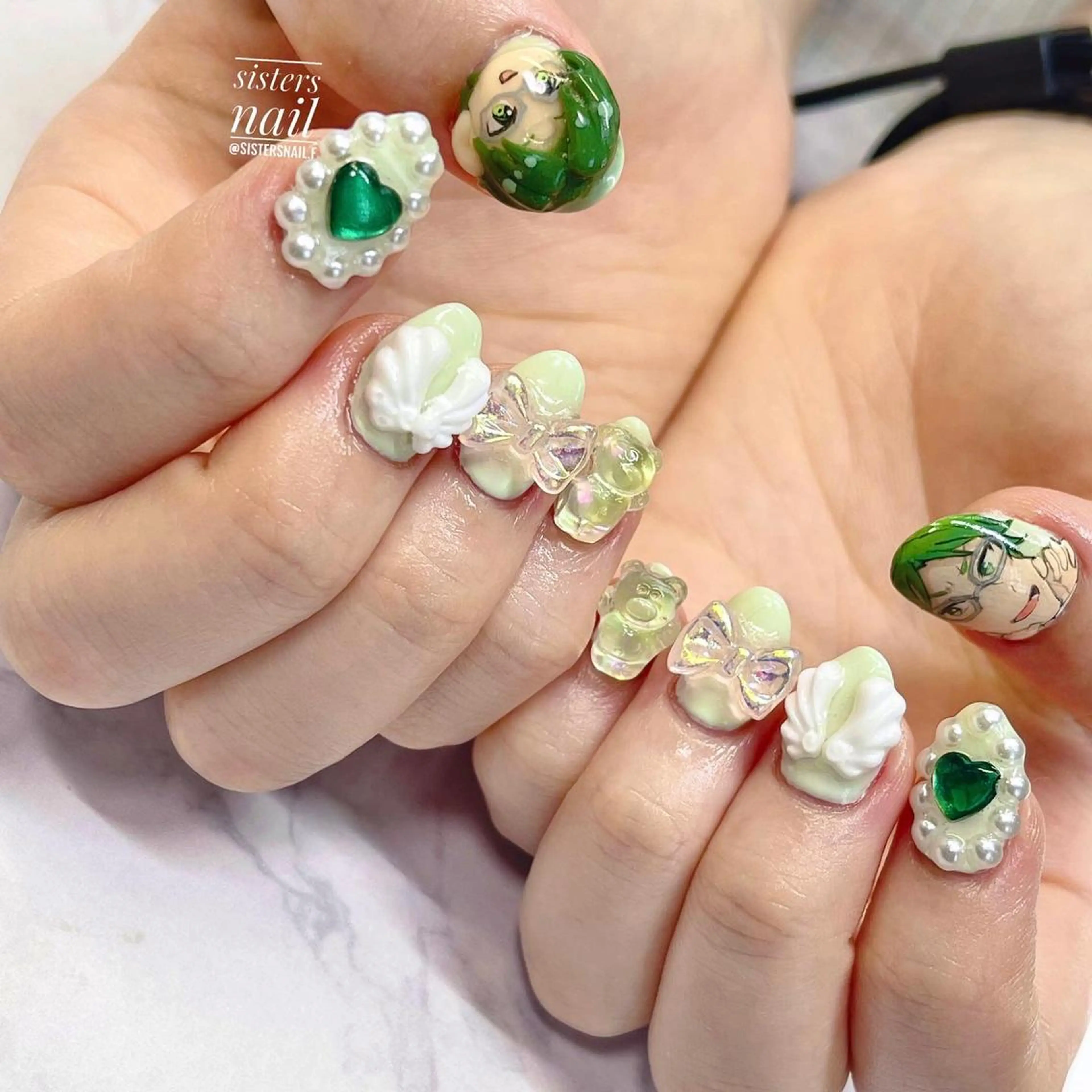 ネイル アートネイル グリーン ハート パステルネイル リボン sisters nail.fのネイルデザイン