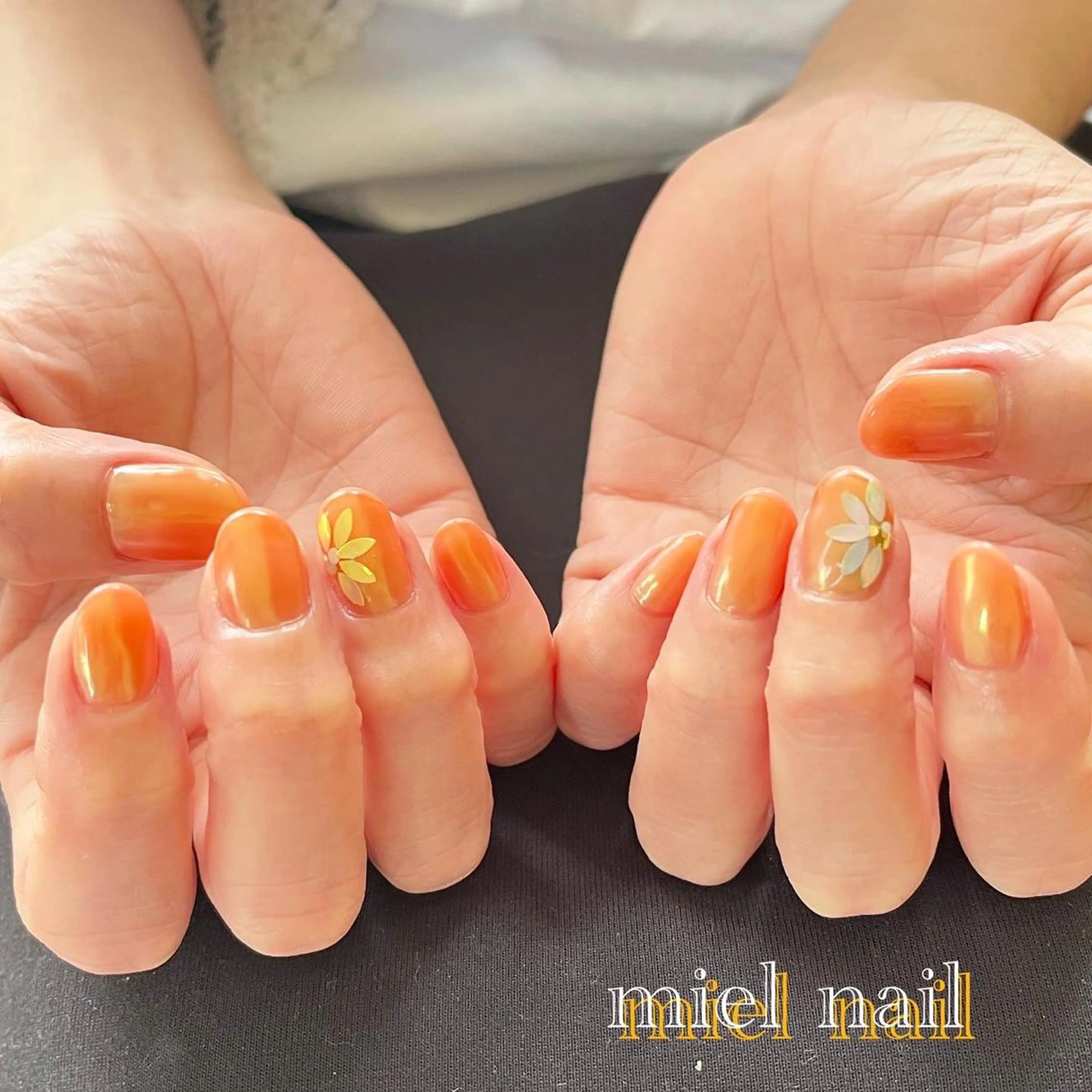 ネイル フレンチネイル キラキラネイル オレンジ ハンドネイル miel nailのネイルデザイン