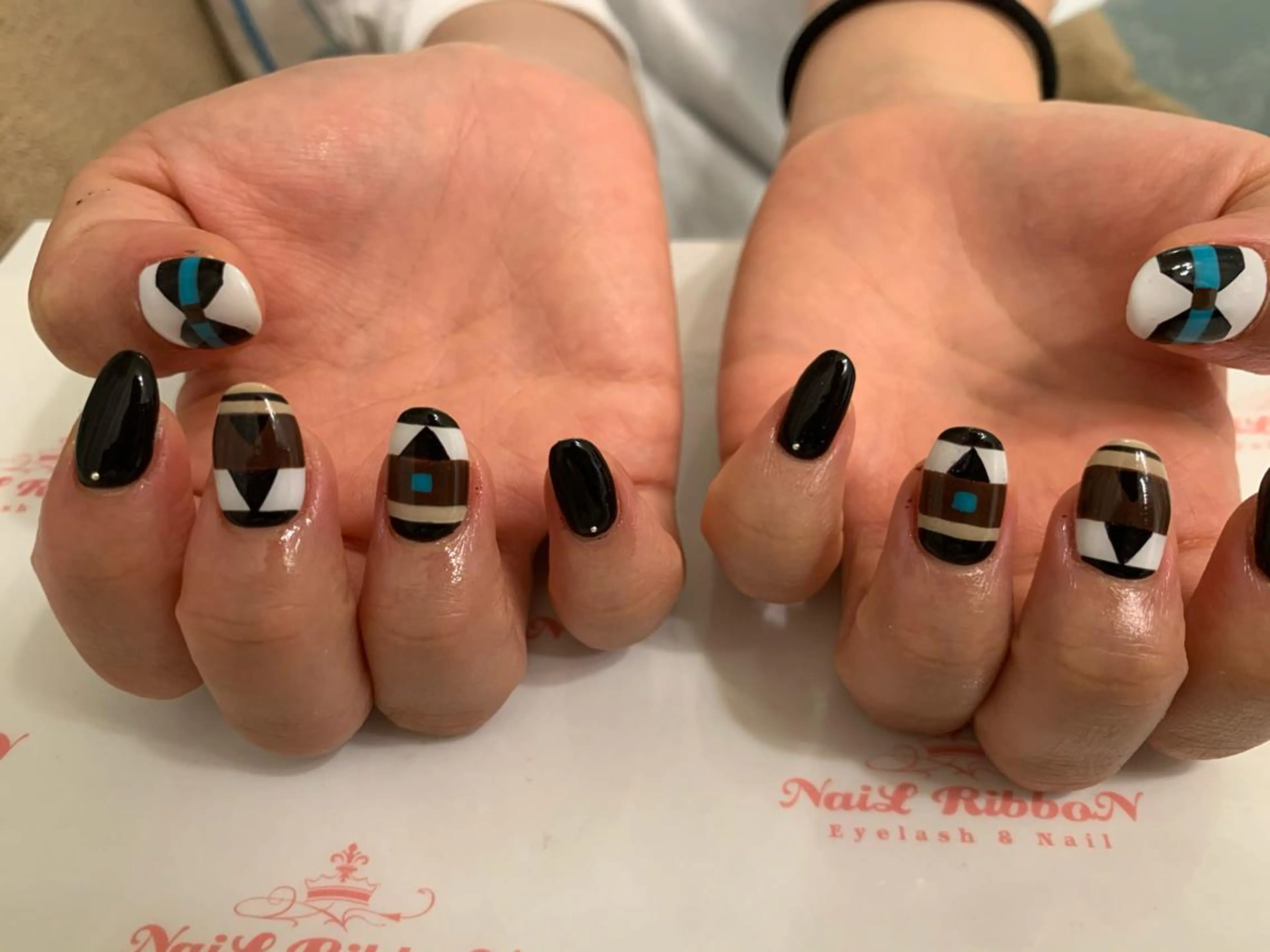 ネイル ネイルリボン 受付スタッフのネイルデザイン