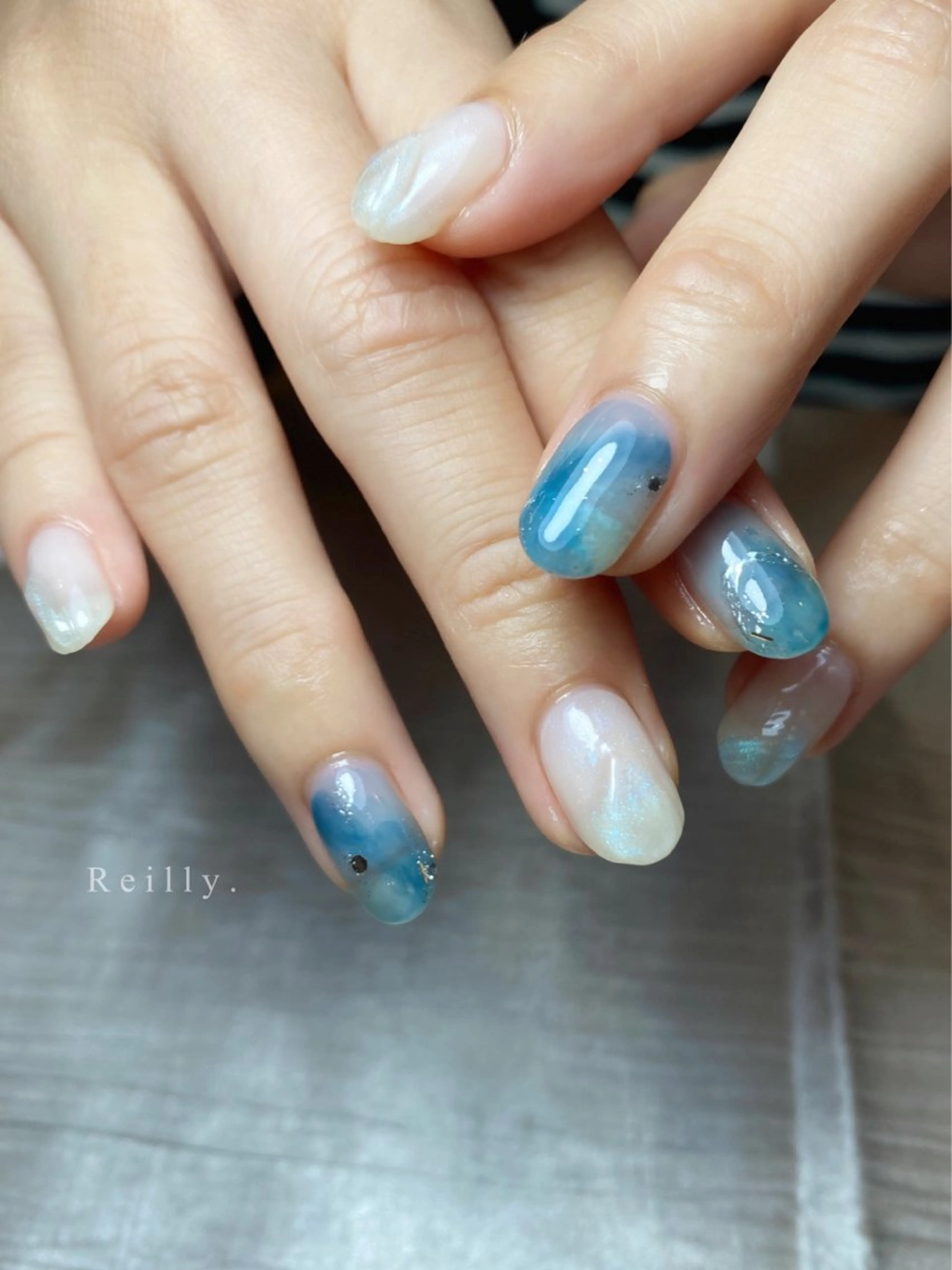 ネイル フラッシュネイル フレンチネイル ジェルネイル グラデーション ラメ(グリッター) Marina 《REILLY.》のネイルデザイン