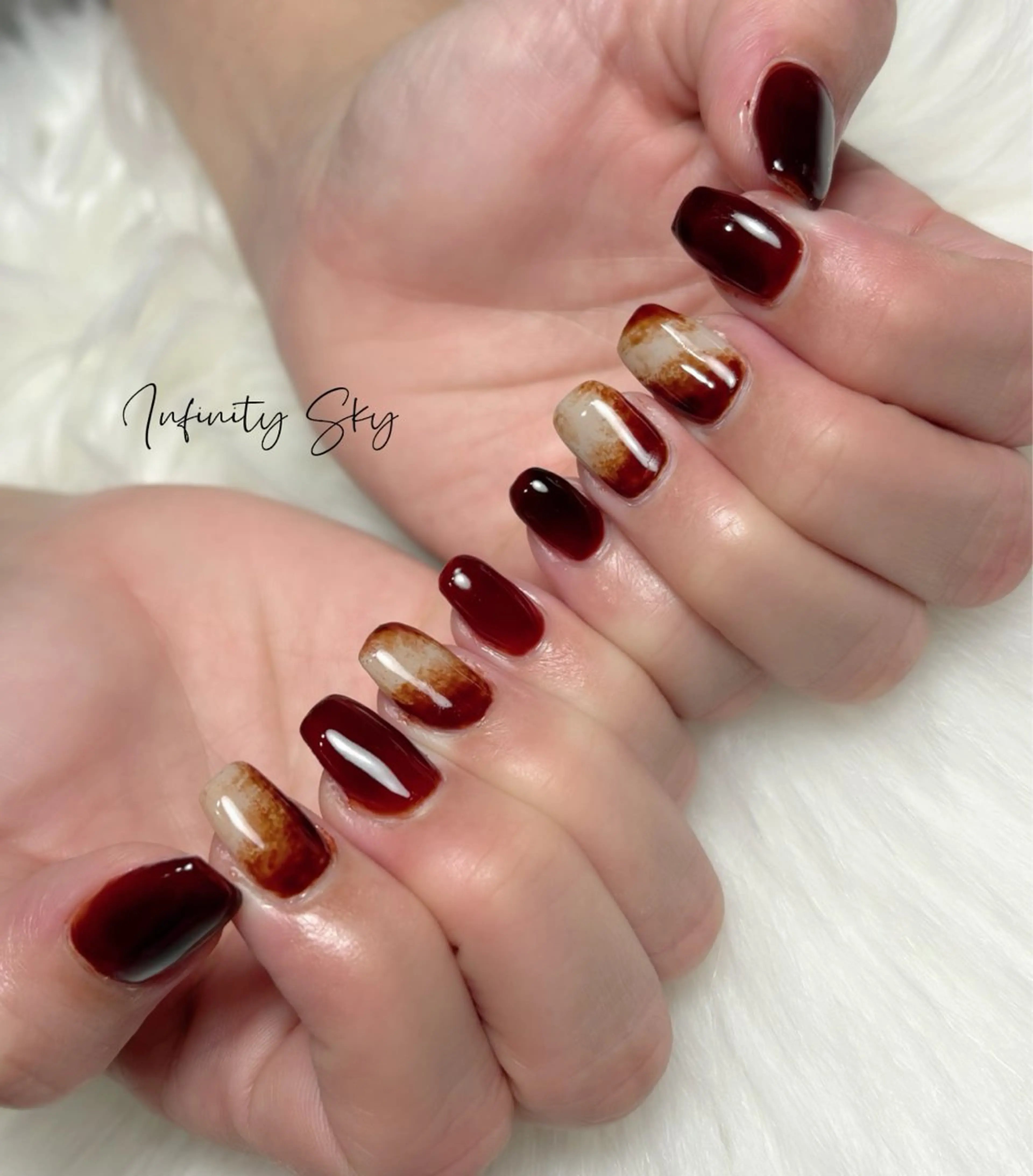 ネイル ブラウン ニュアンスネイル infinity skyのネイルデザイン